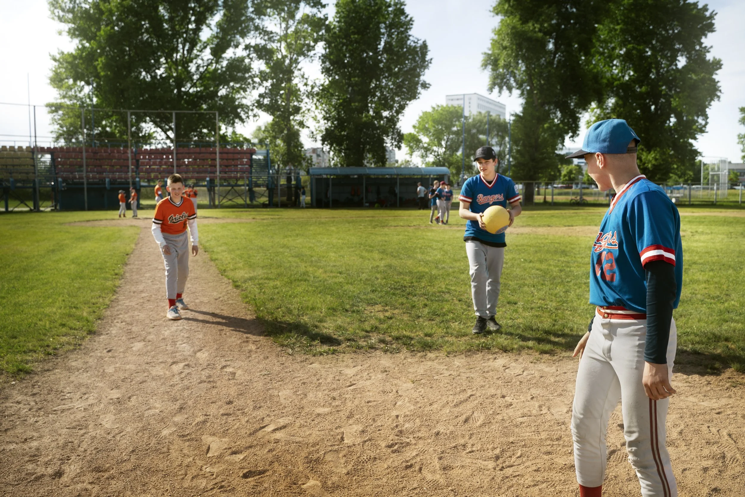 full-shot-kids-playing-kickball.jpg