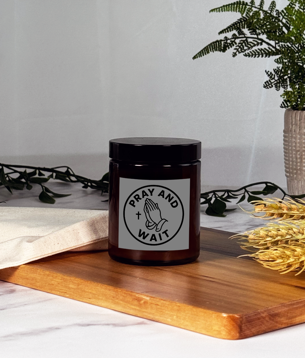 Small Christian scented candle with company logo