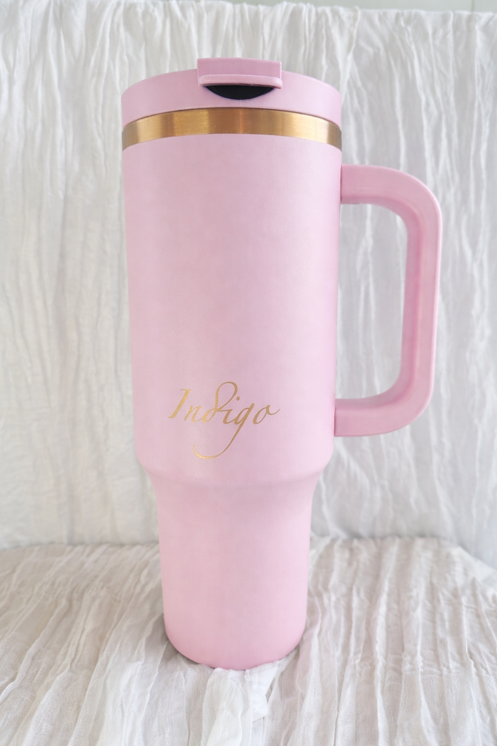 Elegant pink travel mug with gold accents (1).png