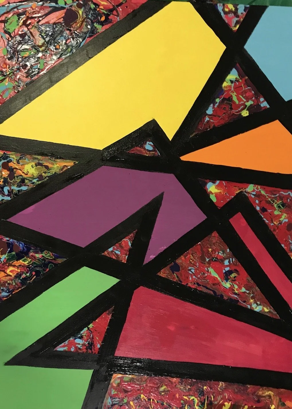 Colorful geometric abstract art with various shapes filled with bright colors including yellow, purple, orange, green, and red, outlined with thick black lines, set against a multicolored splattered background.
