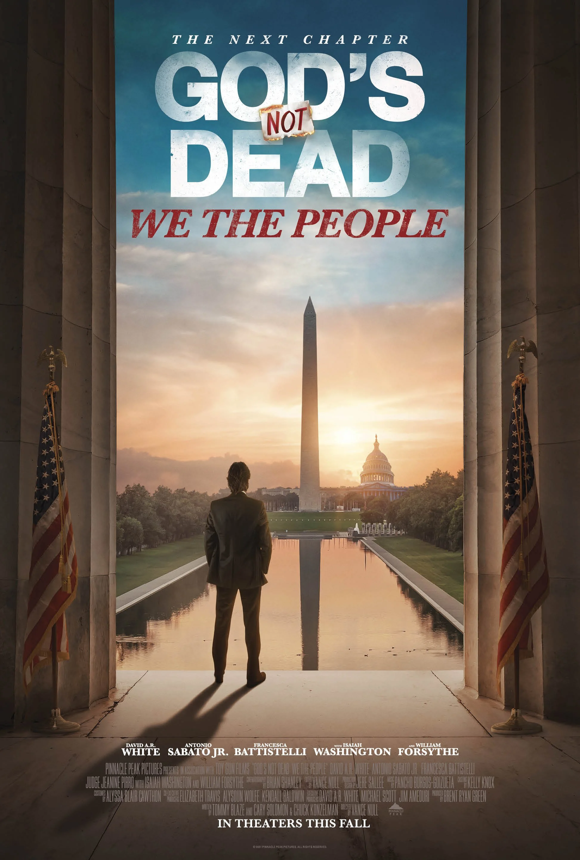 A movie poster for 'God's Not Dead: We The People' shows a man in a suit standing at the entrance of the Lincoln Memorial, looking out towards the Washington Monument and U.S. Capitol at sunrise or sunset. The title is displayed at the top, and the poster includes the names of the actors and the release information at the bottom.