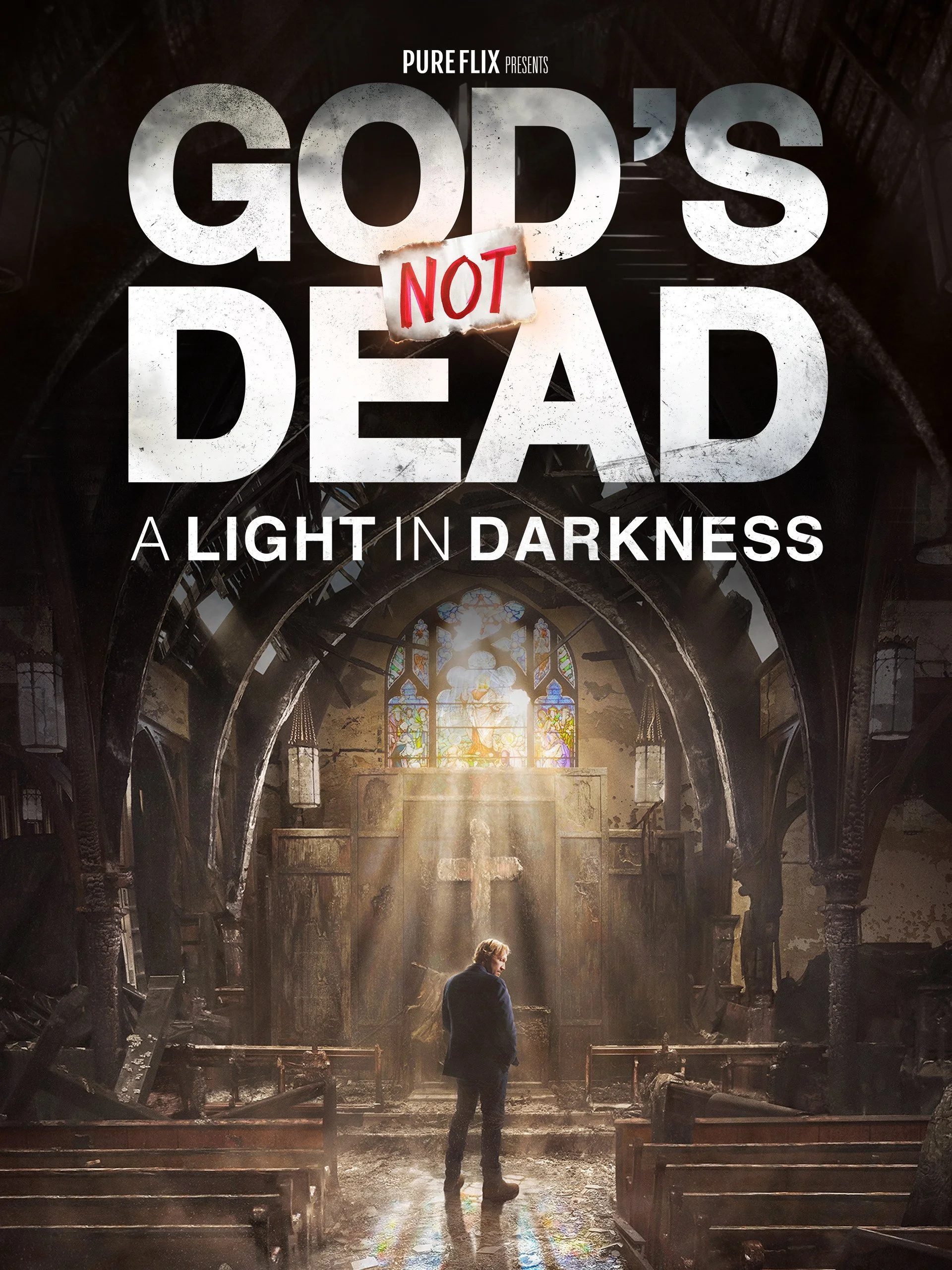 Poster for a documentary titled 'God's NOT Dead: A Light in Darkness' showing a man standing inside a damaged church with stained glass windows and a cross, illuminated by sunlight.