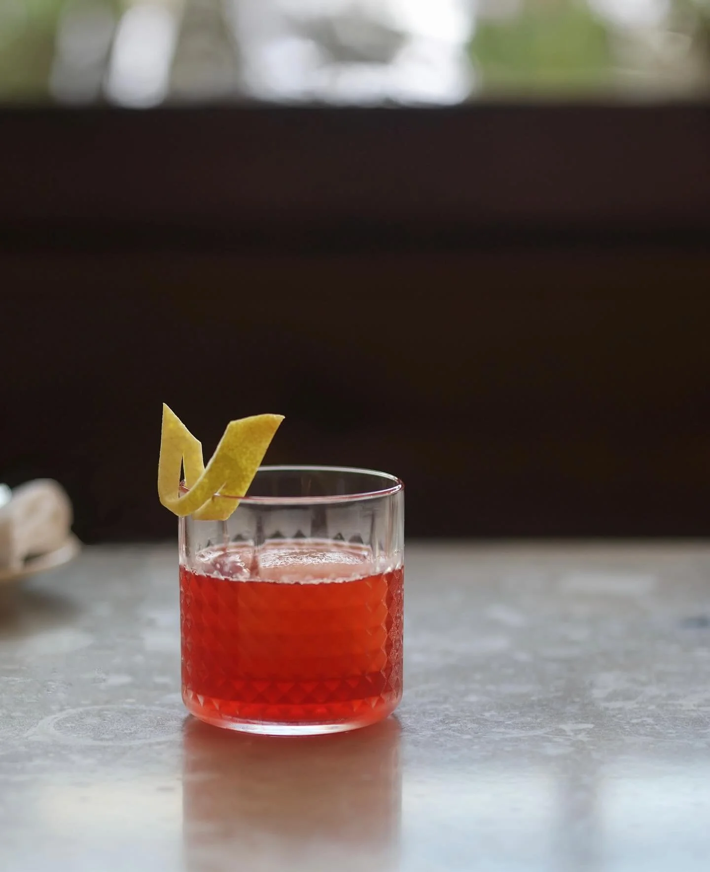 Watermelon season doesn&rsquo;t have to end! Our house Negroni keeps the season going with a big rock made of clarified yellow watermelon from @larderfoods. Starting out like a classic and ending with a sweet watermelon twist as the ice melts makes i