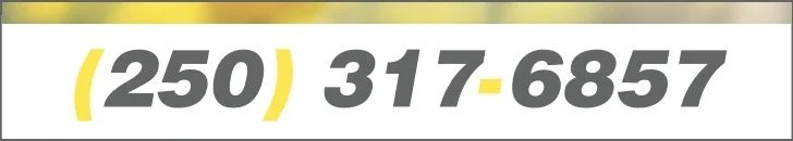 Close-up of a phone number in black and yellow text, with the area code in yellow parentheses, followed by the local number and then a hyphen.