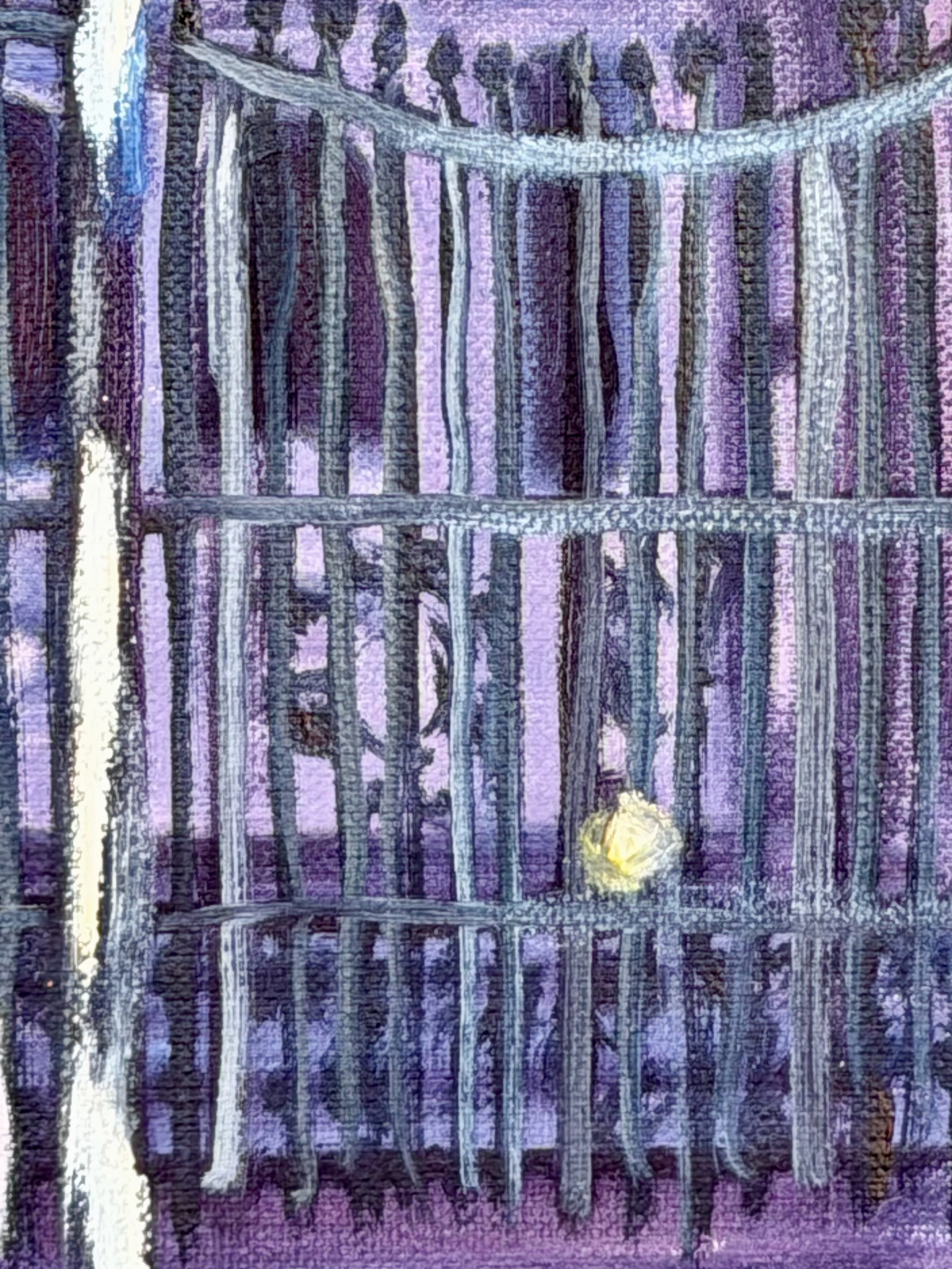A purple metal fence with vertical and horizontal bars and a yellow flower at the bottom center.