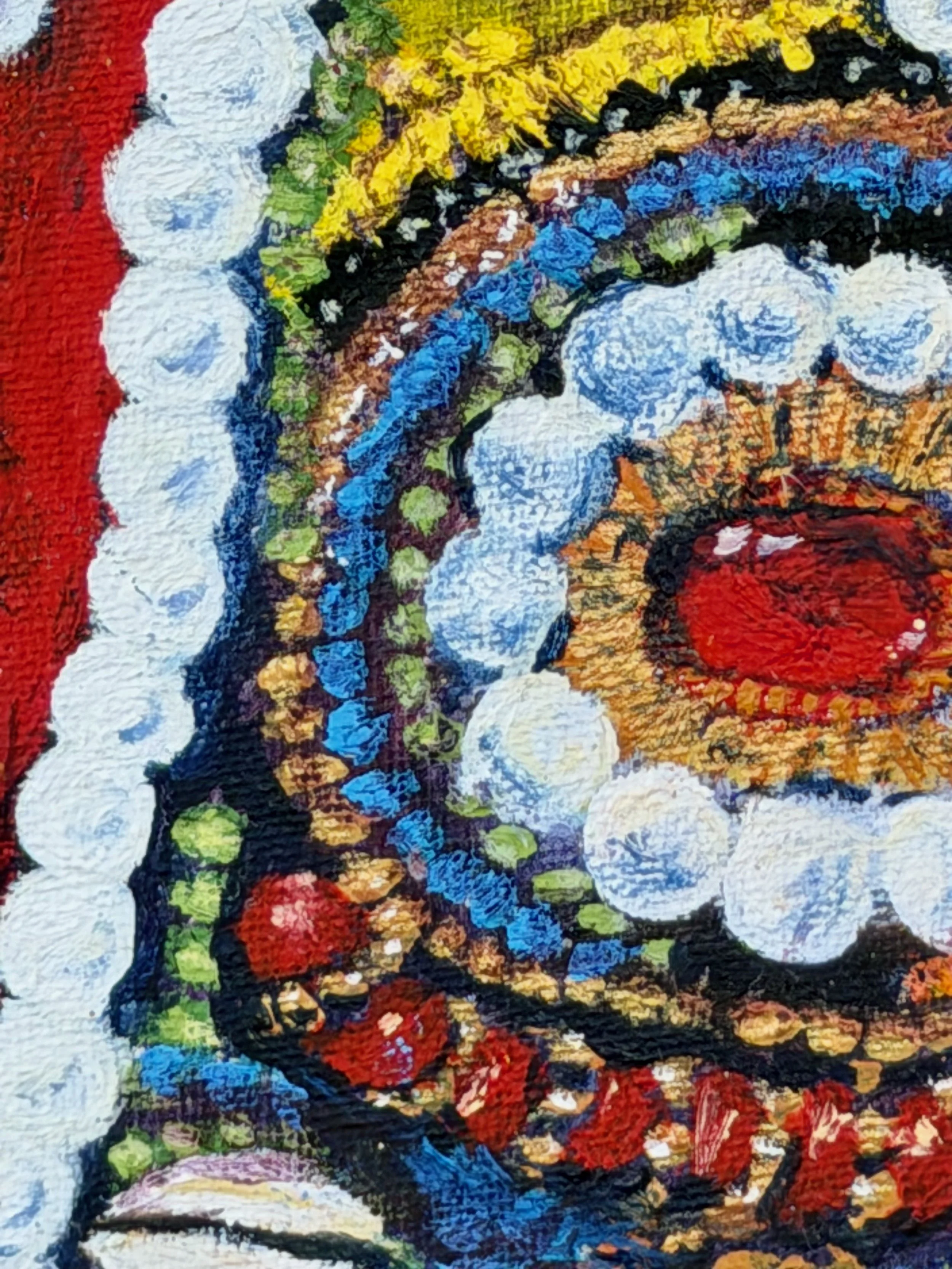 Close-up of a colorful floral painting with white, blue, yellow, red, and black details.
