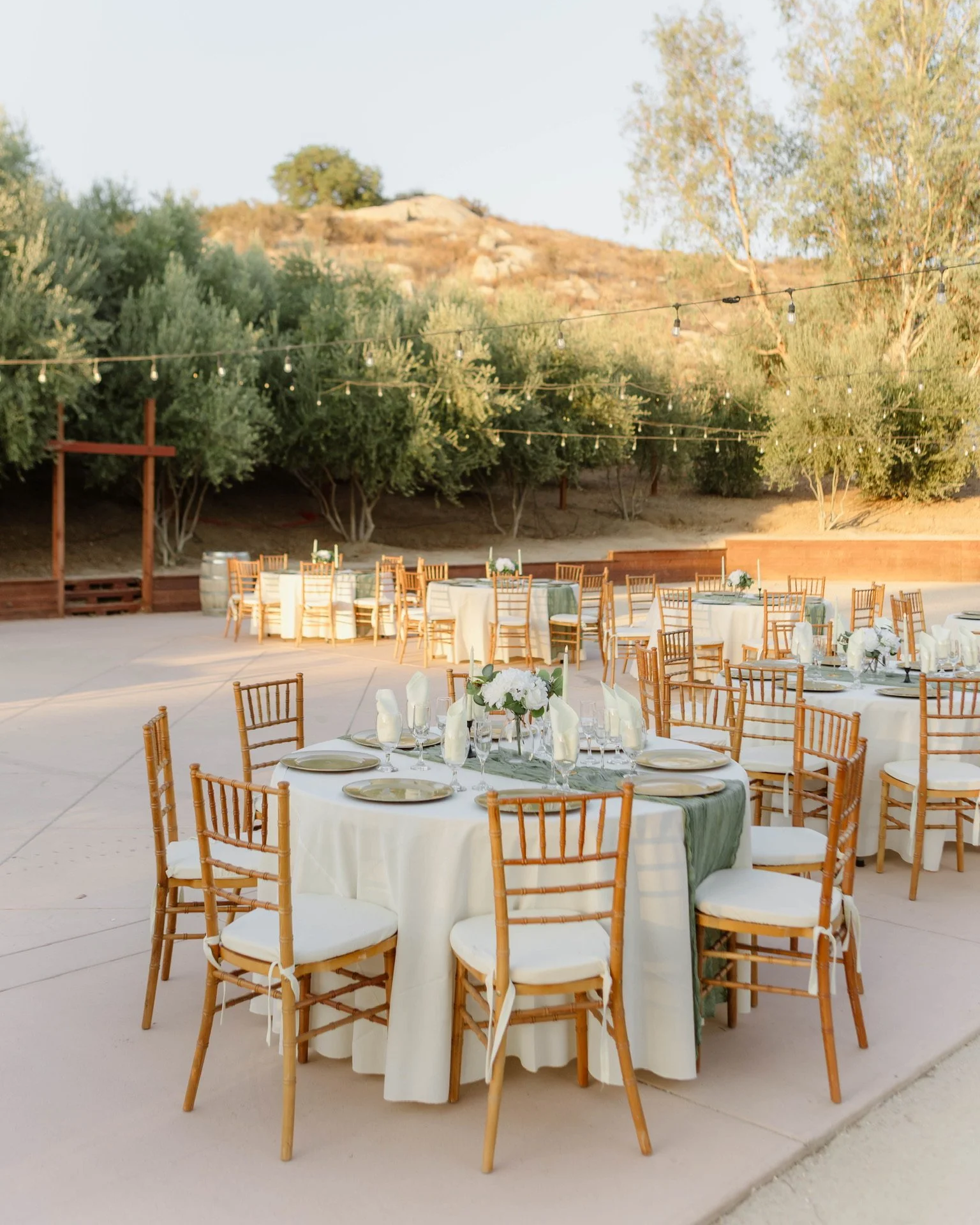 Tables setup at outdoor celebration event setup at Monarca Ranch event venue in Hemet California