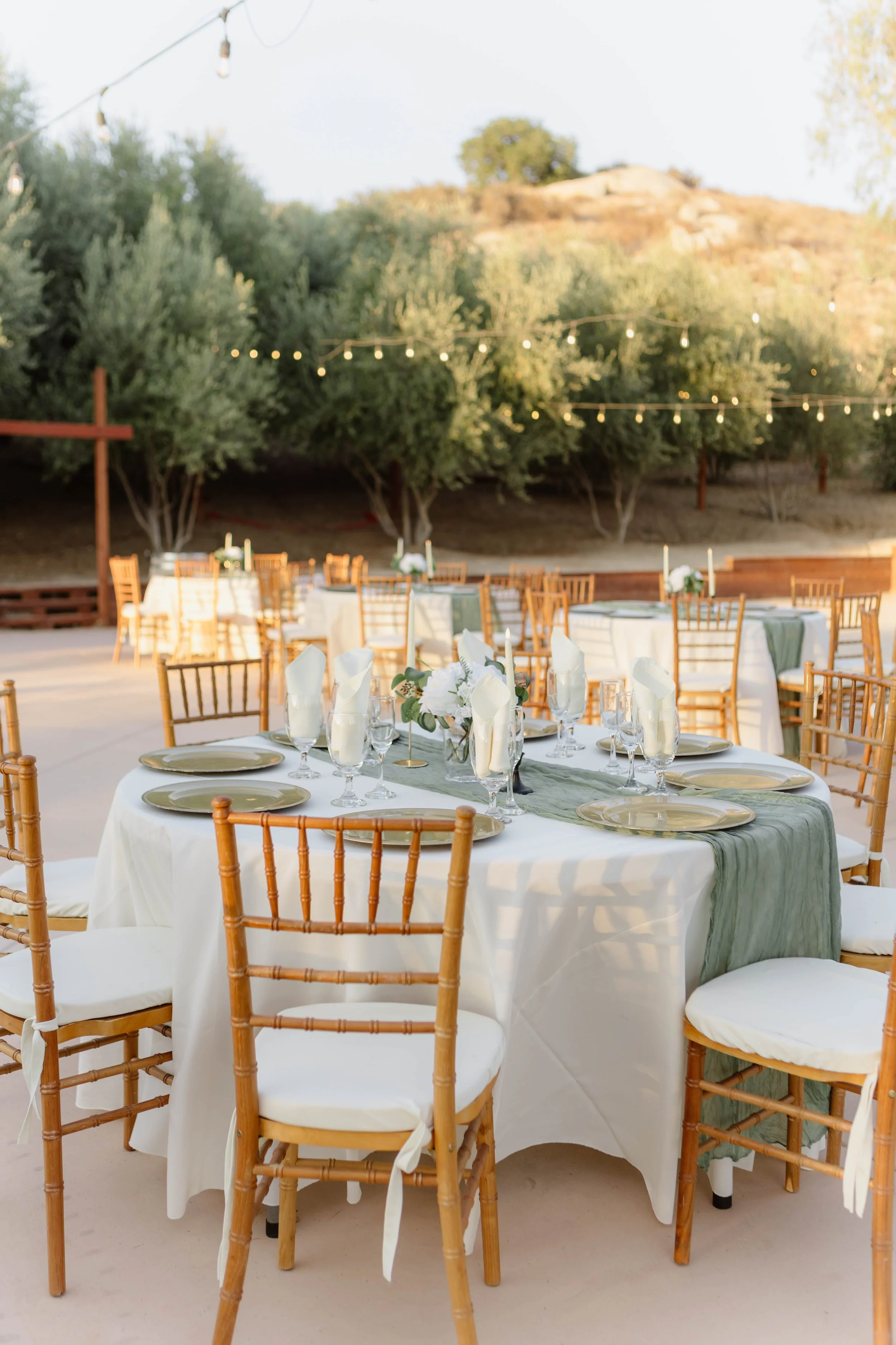 Outdoor reception setup with decorated tables at Monarca Ranch event venue Hemet CA