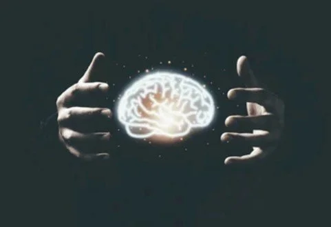 Hands holding brain in the dark. Image used by Dr. Jessica Knape of HealthSpan Internal Medicine in Boulder, CO..jpg