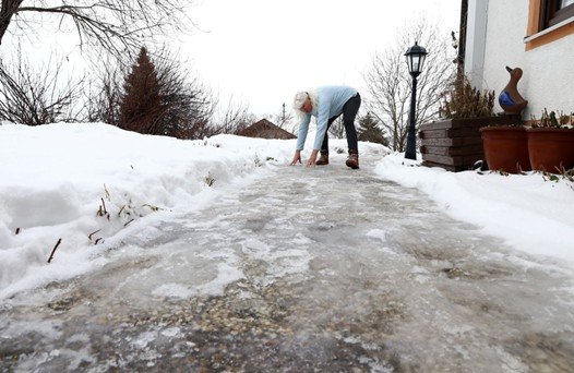An elder man getting up from a fall on a snowy street for blog about why are falls so deadly in older adults and what can be done to prevent them by Dr Jessica Knape of HealthSpan Internal Medicine in Boulder, CO.jpg