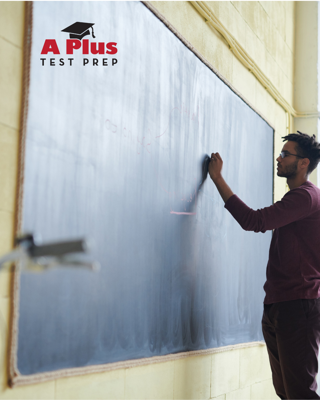 A person writing on a classroom chalkboard with a logo that reads 'A Plus Test Prep' in the top left corner.