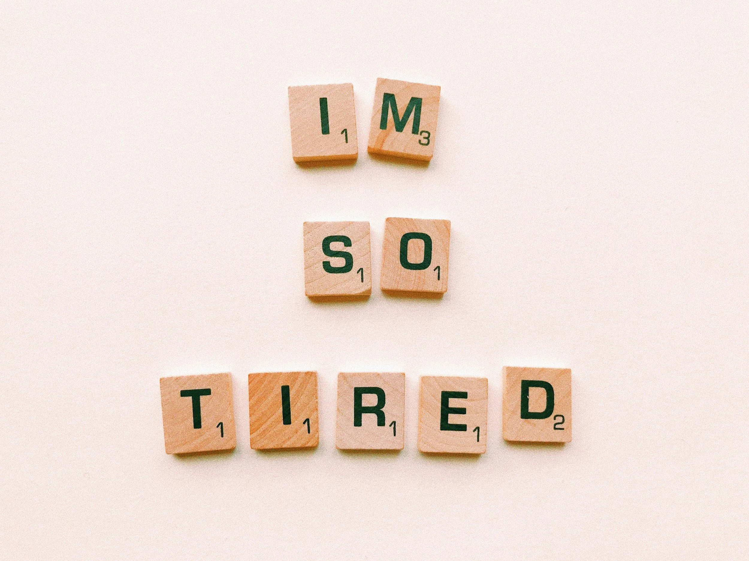 I'm so tired written out in scrabble tiles