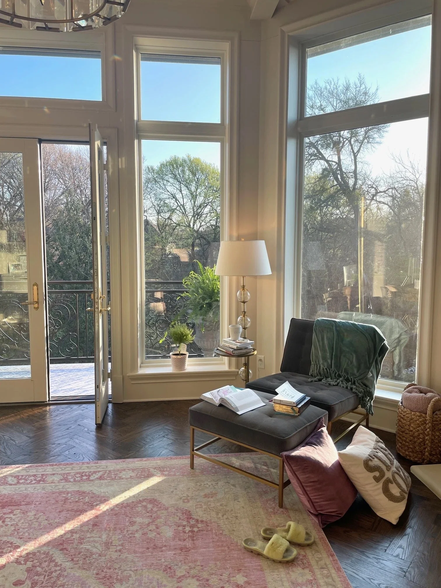 Image of a cozy bedroom chair and window.