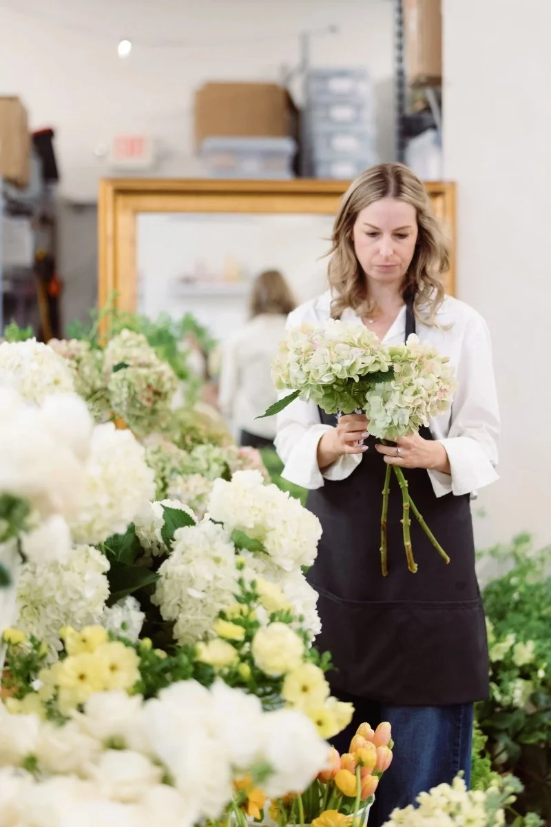 Kim is making a bouquet