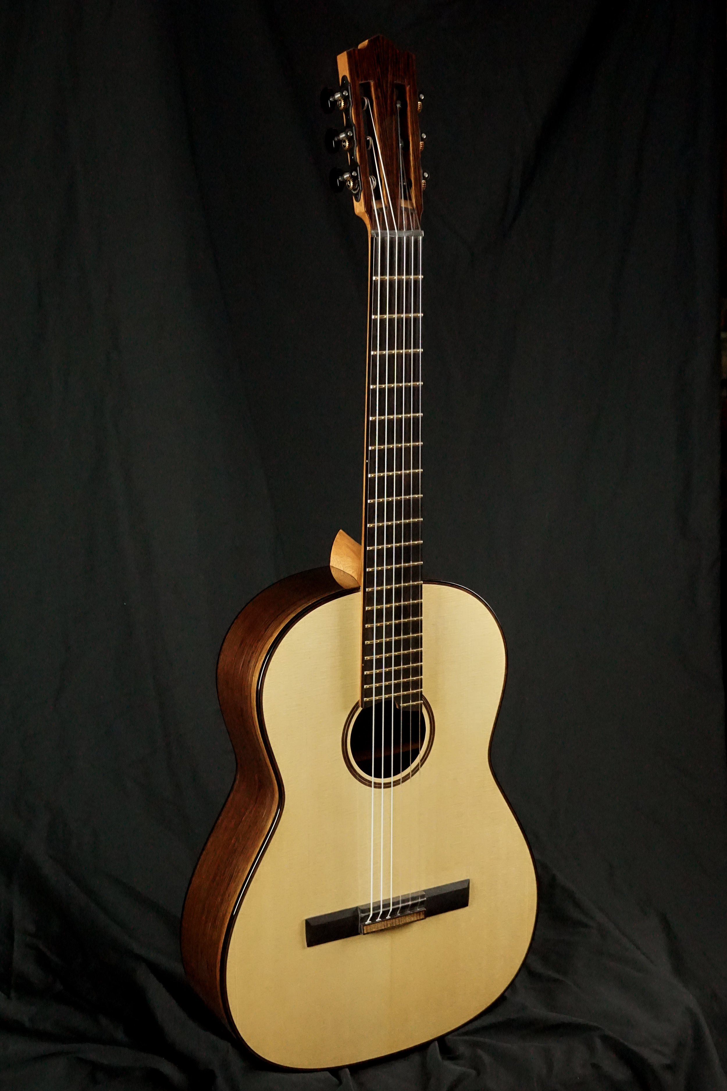 Sipe Spartan Model Guitar on black background