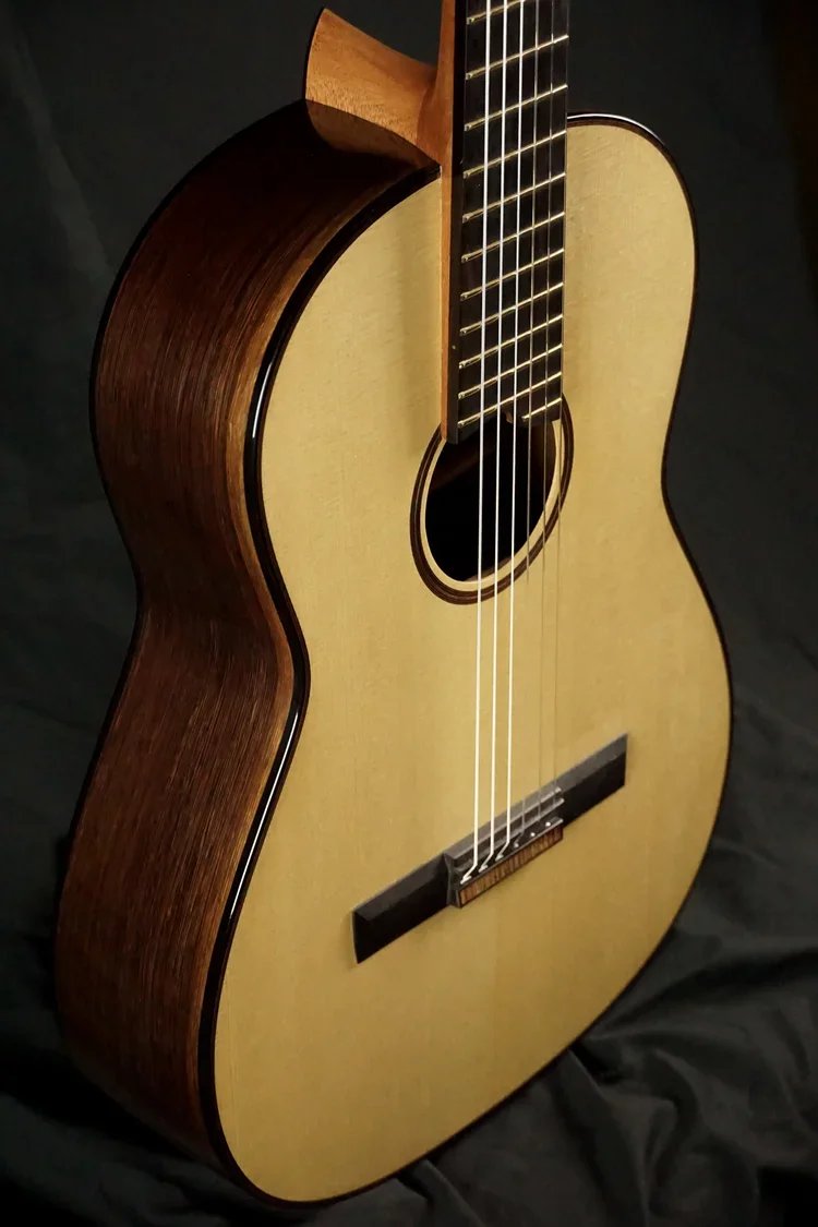 European Spruce top on a wenge classical guitar.jpg.webp