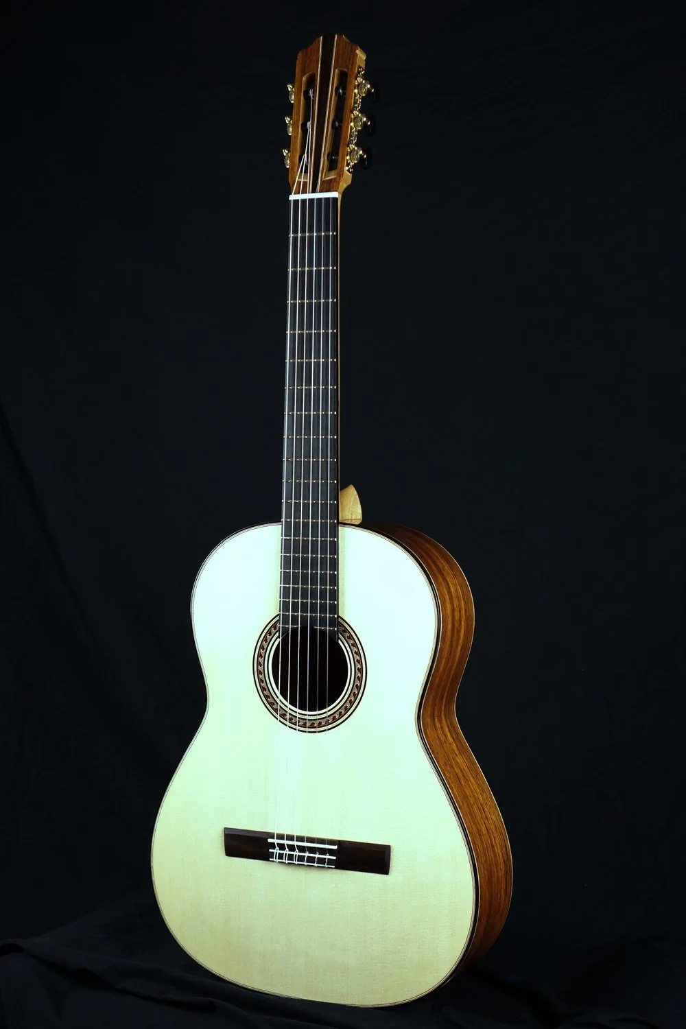 burmese rosewood classical guitar front.jpeg