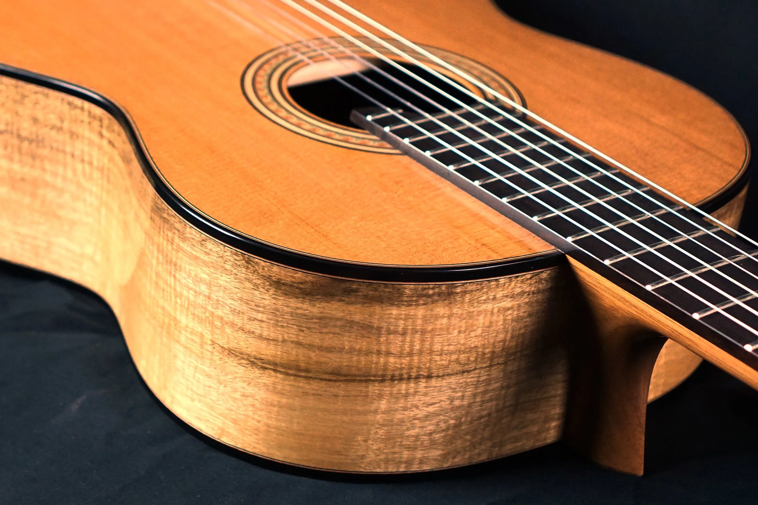 myrtle wood guitar from front.jpeg