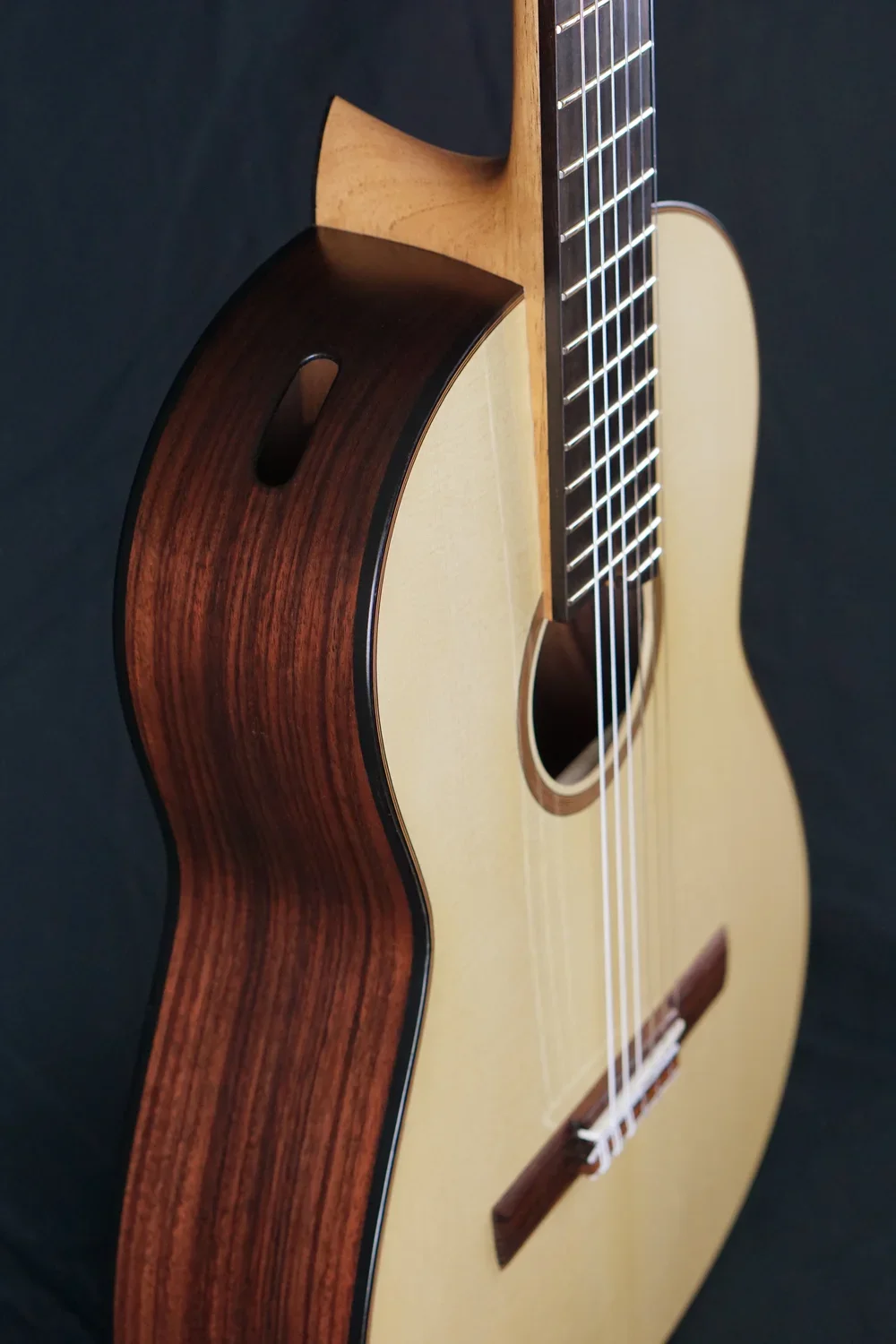 Classical Guitar with Soundport on shoulder.webp