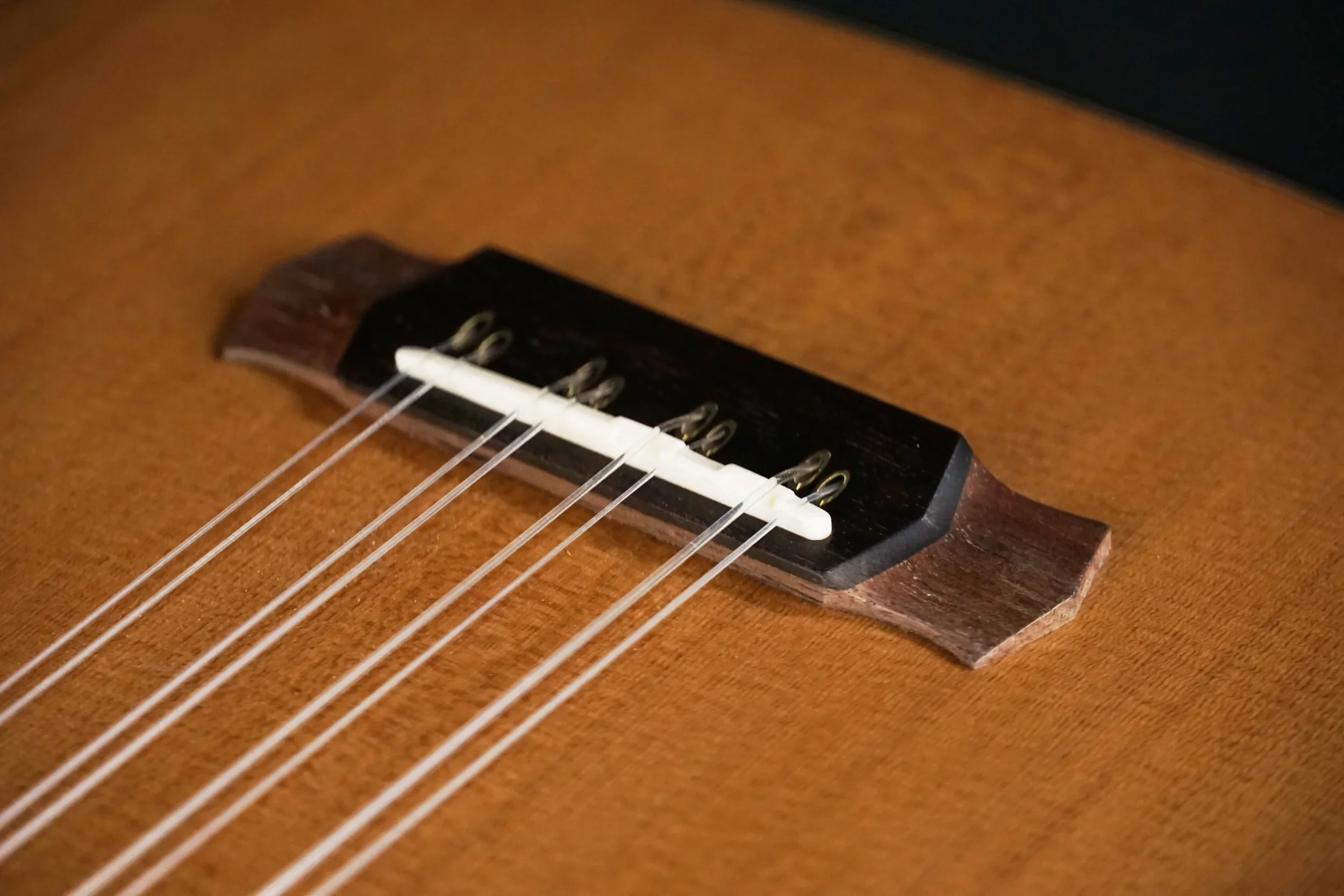 eight string uke bridge.webp