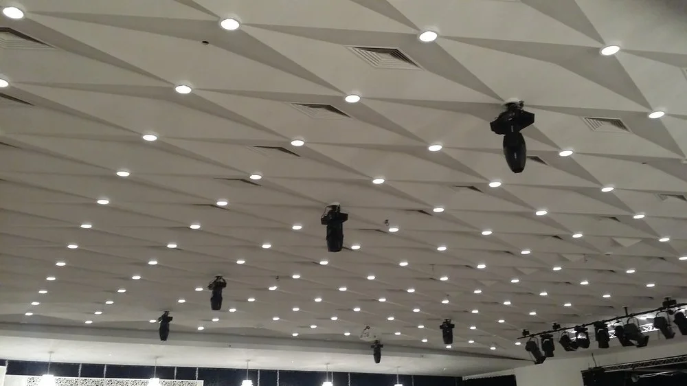 White ceiling with geometric pattern.