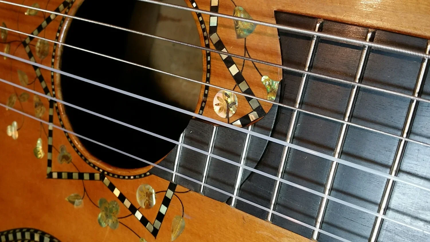 romantic guitar fingerboard extension.