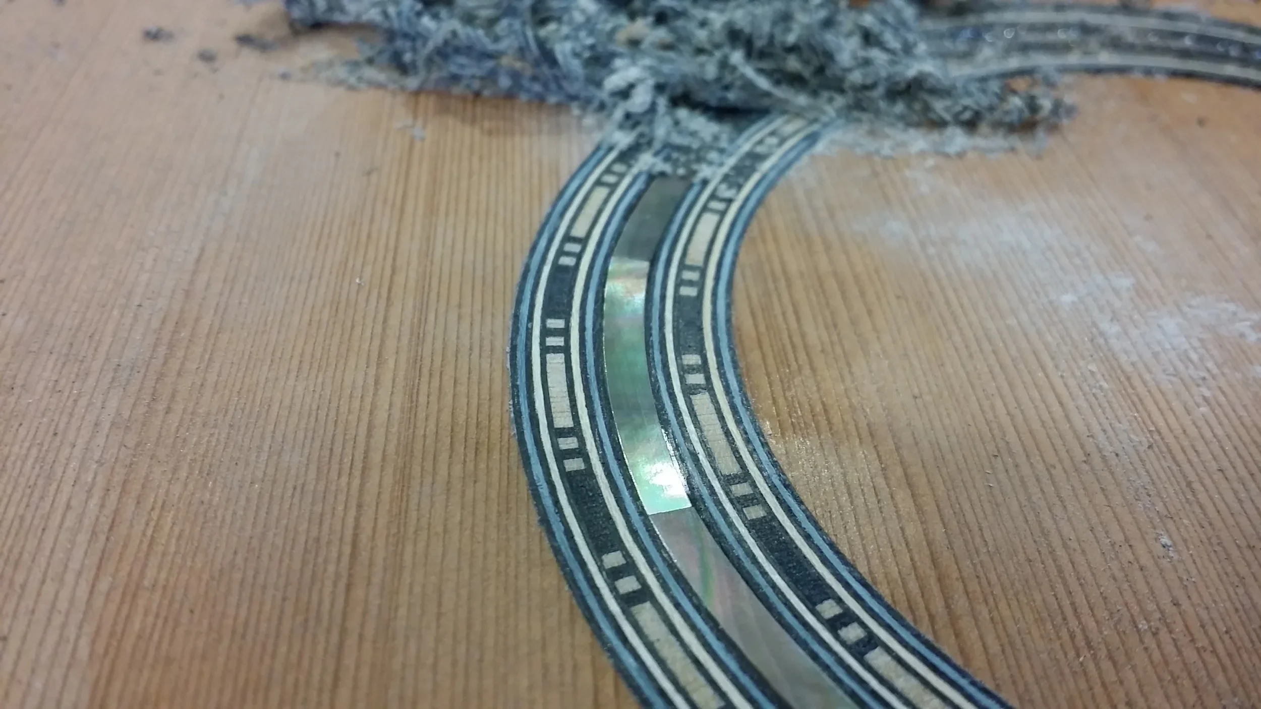 Rosette made with Tahitian Mother of Pearl with shavings.