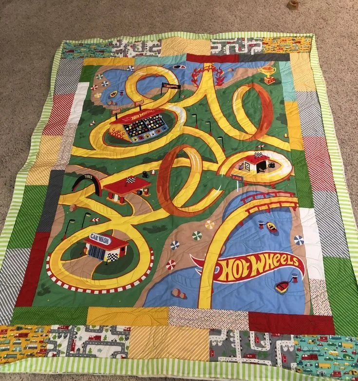 Bloomington, Illinois quilt artist, wife and mom, offering custom baby quilts, memorial quilts, wedding quilts and specialty designs shipped globally.