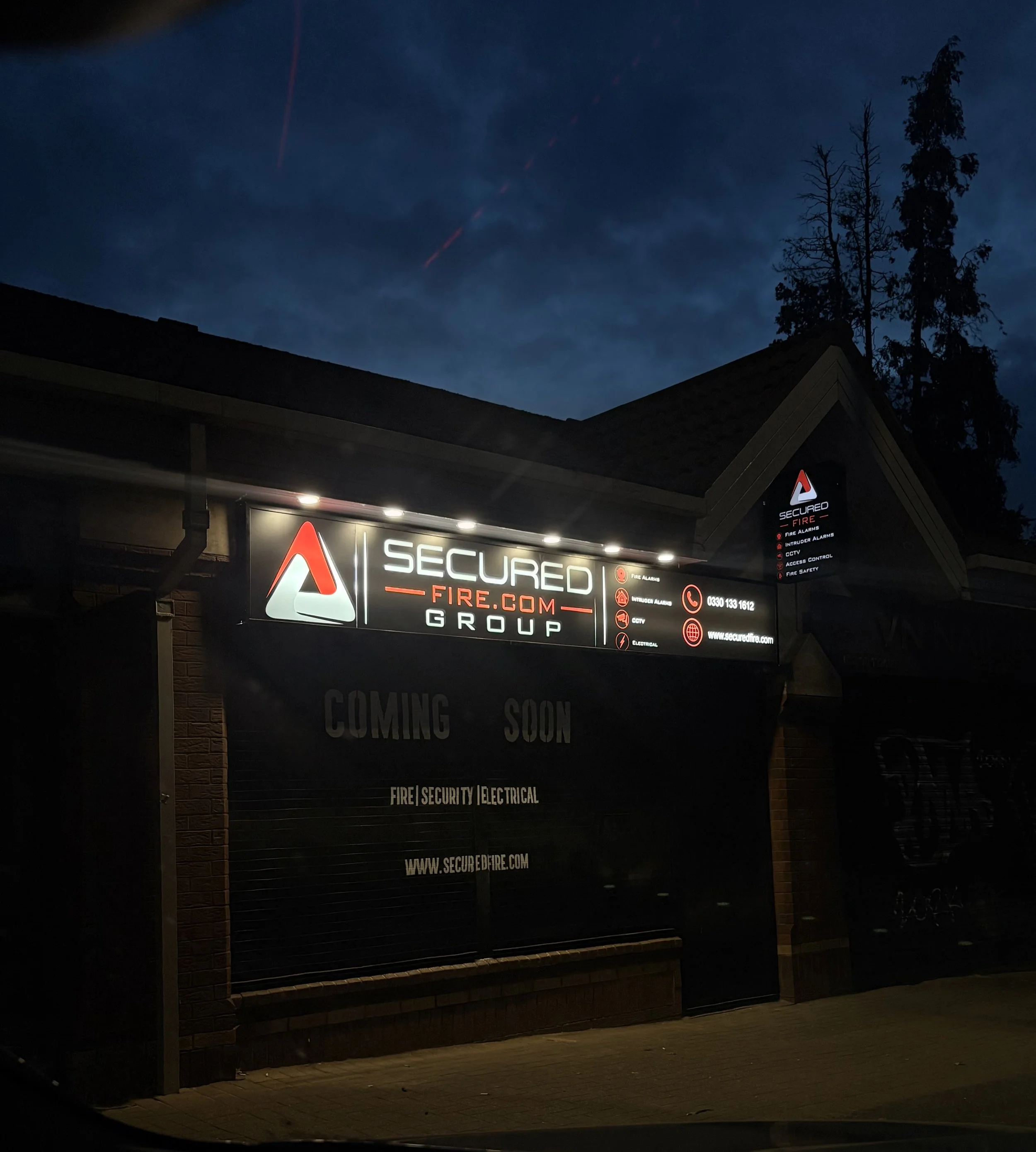 Secured Fire’s new fire, security and electrical showroom and offices on Saintfield Road, Belfast, promoting a chance for customers to win £500.