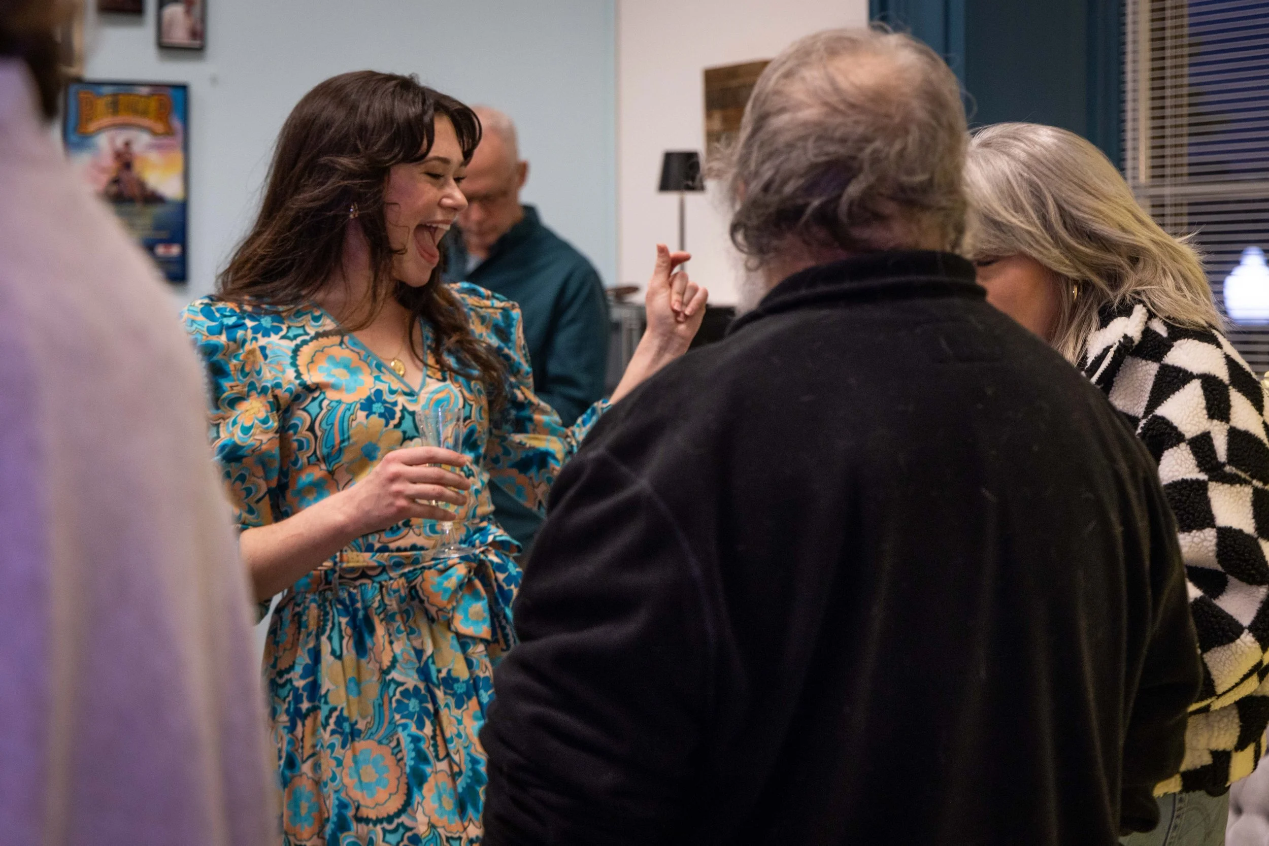 CEO Emilia Torello laughing with teaching artists Steve Vernon and Terri Hsu at the PTPT Studio Open House on December 17, 2025.

Photographer: Riley Moore