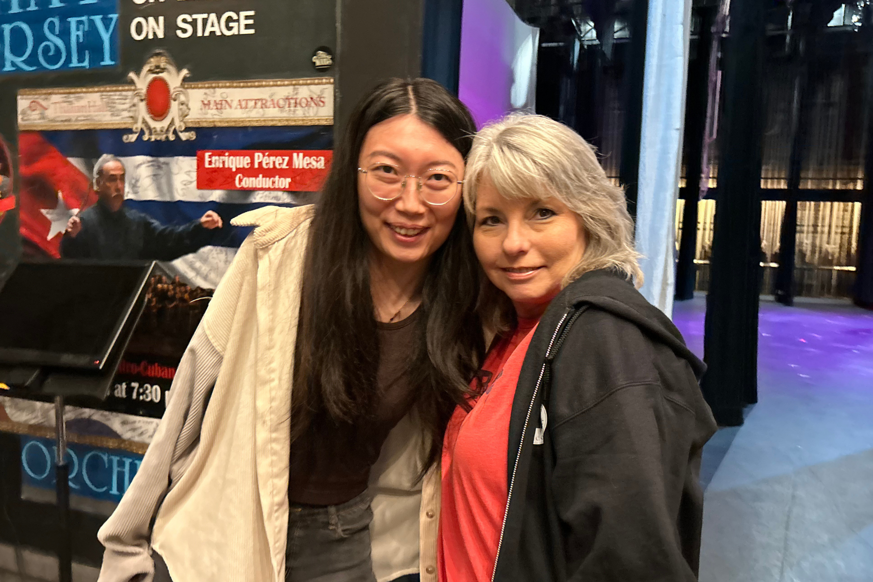 Apprentice Stage Manager Yahui Liao with Mentor Terri Hsu backstage of the 2025 Apprentice Production of BYE BYE BIRDIE at Thalian Hall