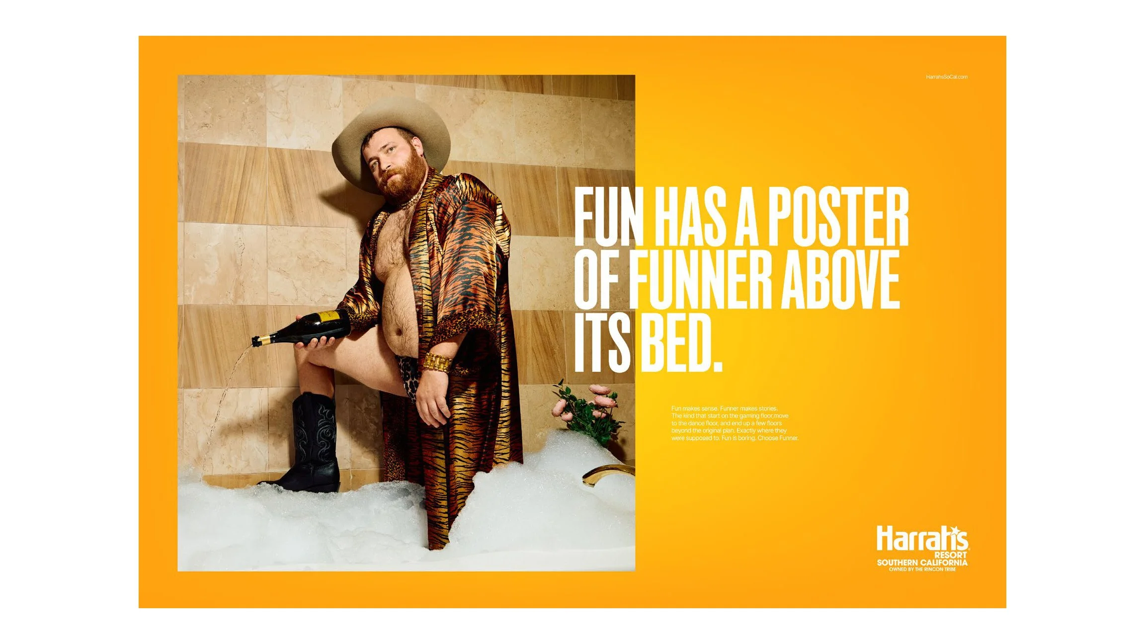 Harrah's ad "Fun has a poster of Funner above its bed." with a man in a cowboy hat in a bubble bath