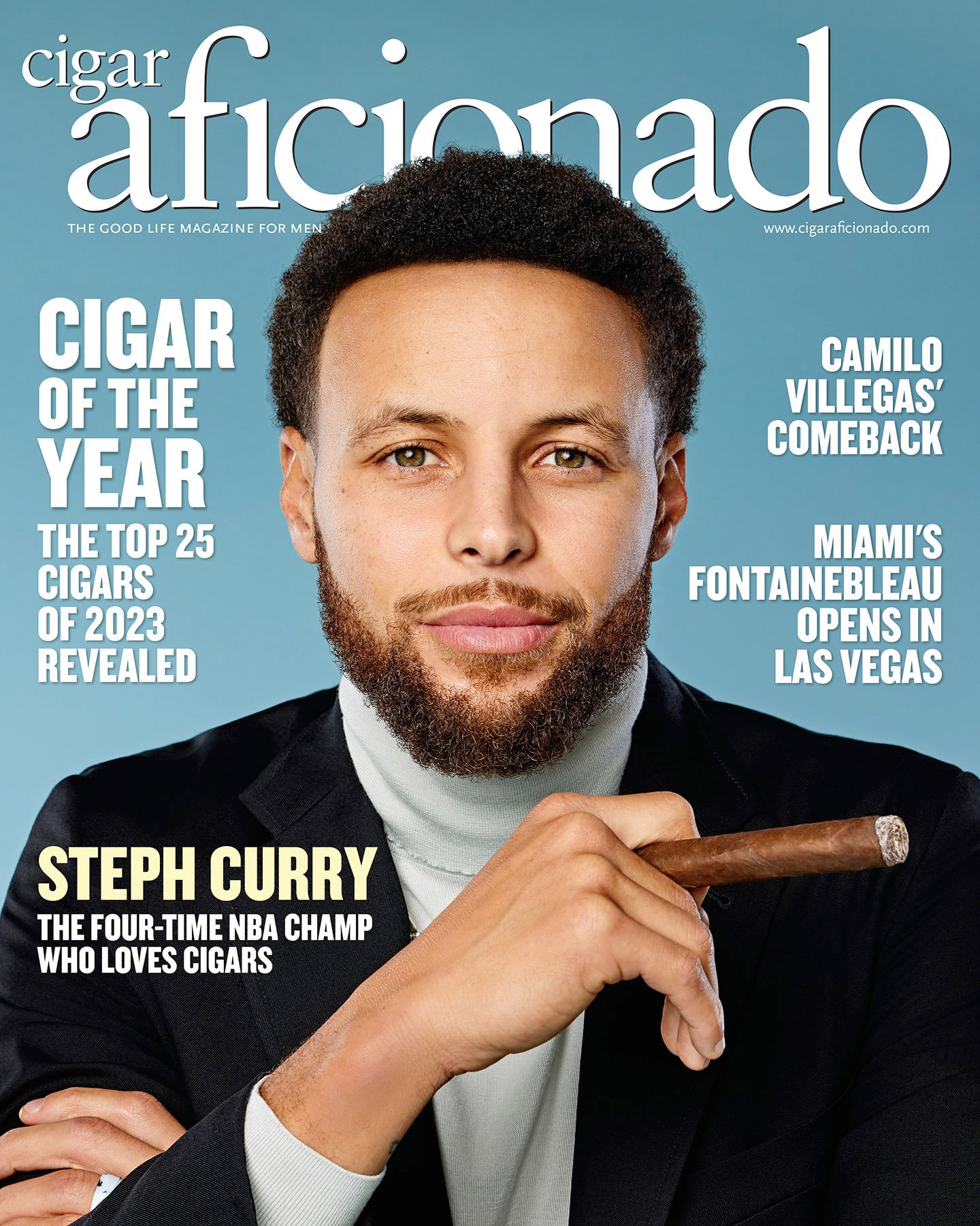 Magazine cover featuring a man with curly hair and a beard holding a cigar, with text highlighting topics like cigars, Steph Curry, Camilo Villegas, and Fontainebleau hotel opening.