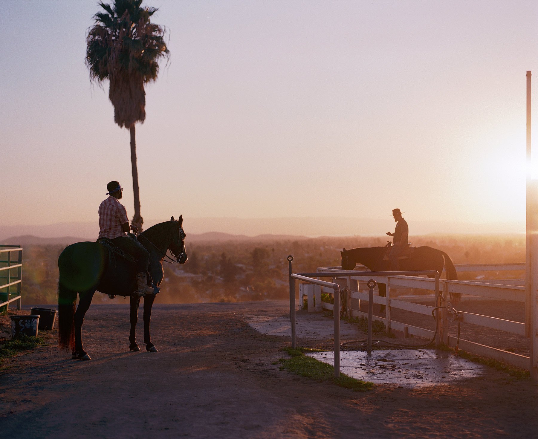 Black Cowboy Prince Damons rides his horse at the ranch in the East Bay  hills of the Bay Area