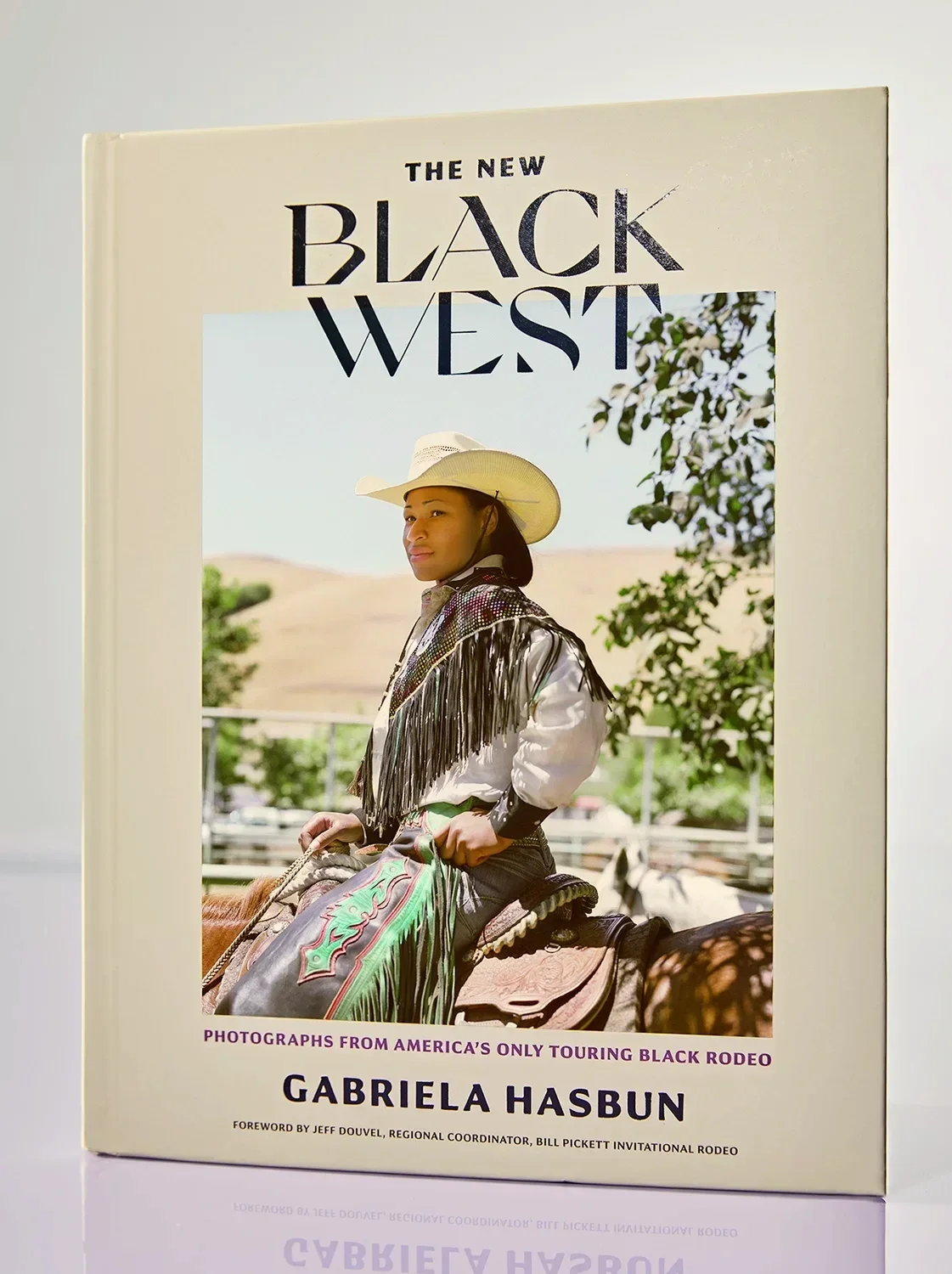 "The New Black West: Photographs from America's only touring Black Rodeo cover image photographed by editorial and commercial photographer Gabriela Hasbun who is based in San Fr