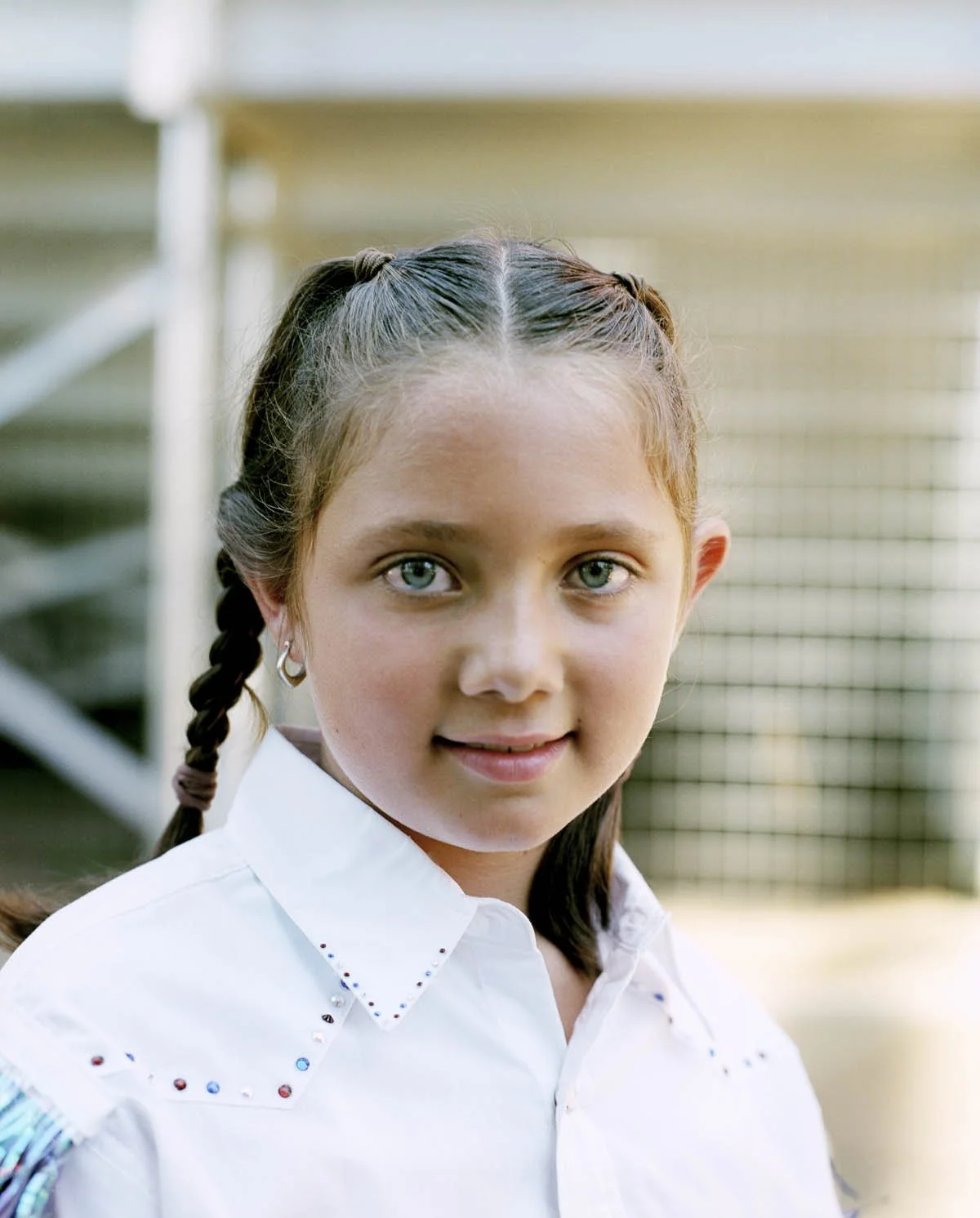Young rider at the Silver Buckle Rodeo in Indian Valley, California by western photographer Gabriela Hasbun.