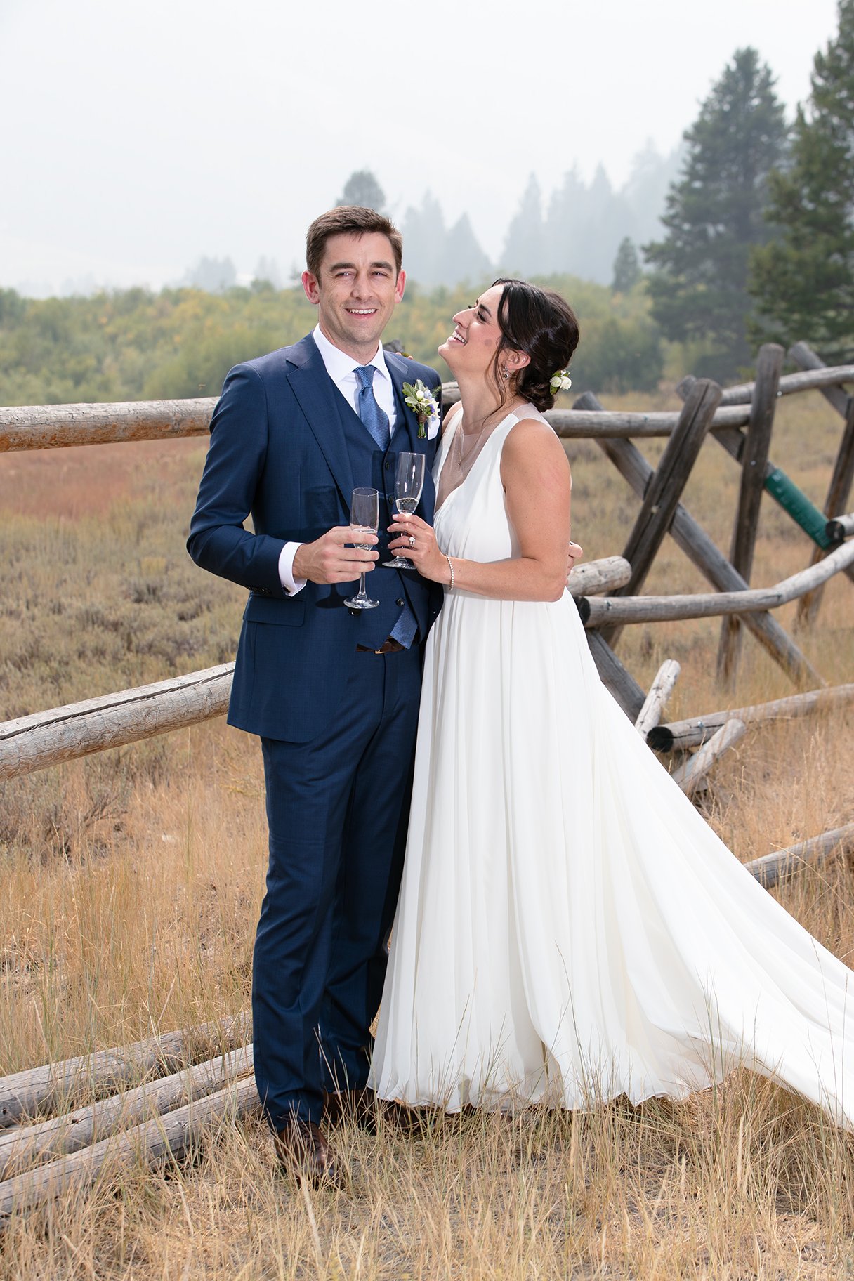 bride-and-groom-opening-and-drinking-champagne.jpg