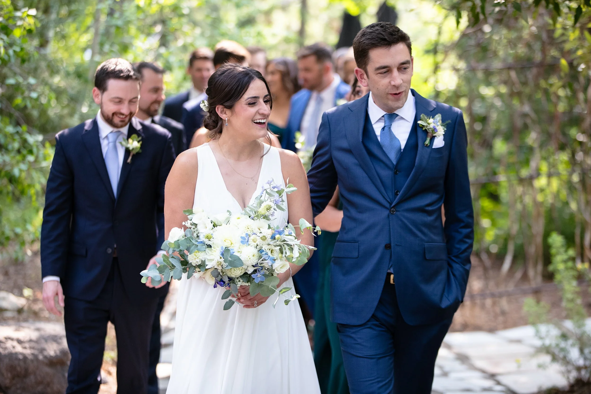 wedding-party-walking-in-garden-plumpjack-tahoe.jpg