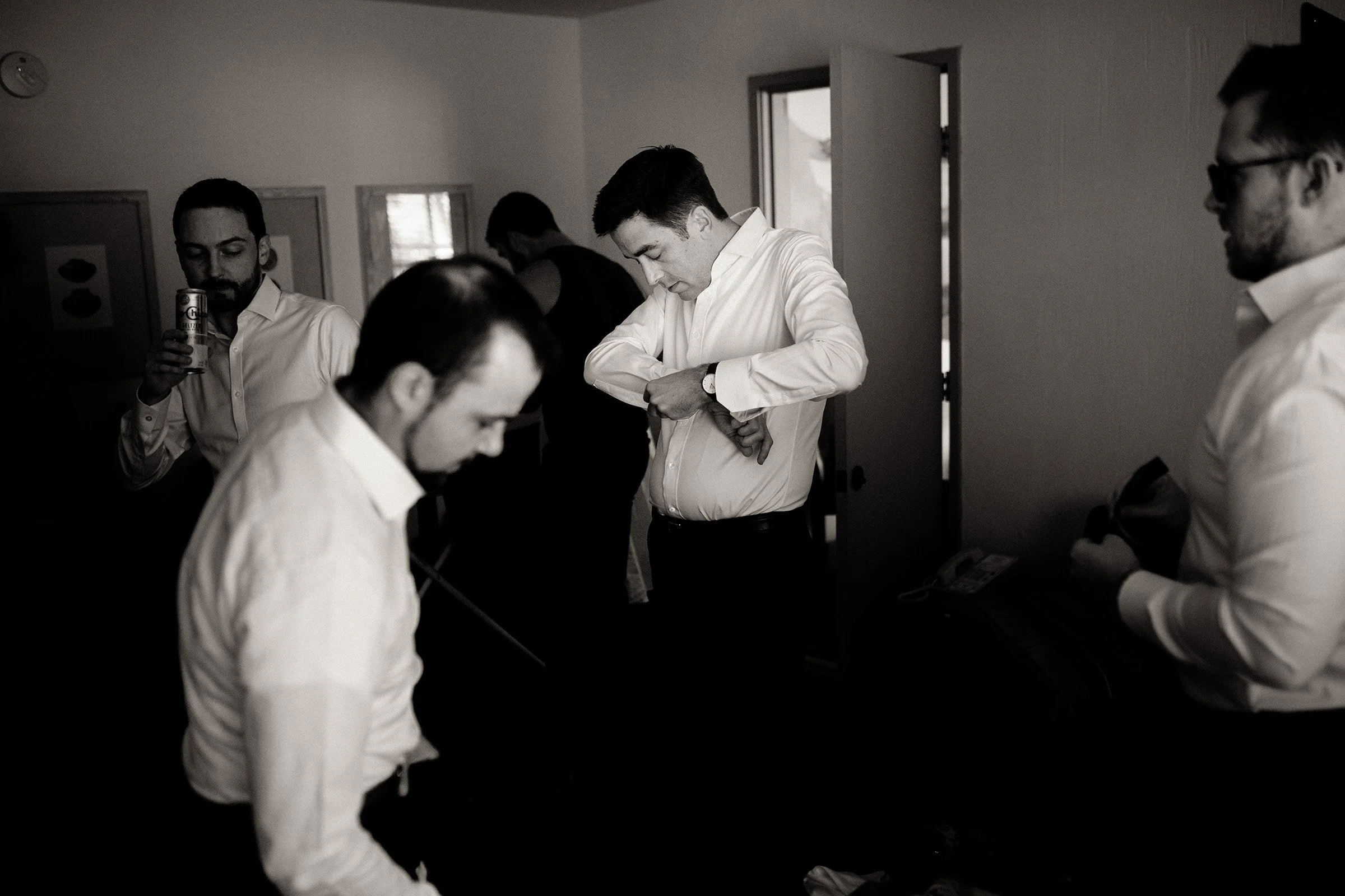 groom getting dressed tahoe.jpg