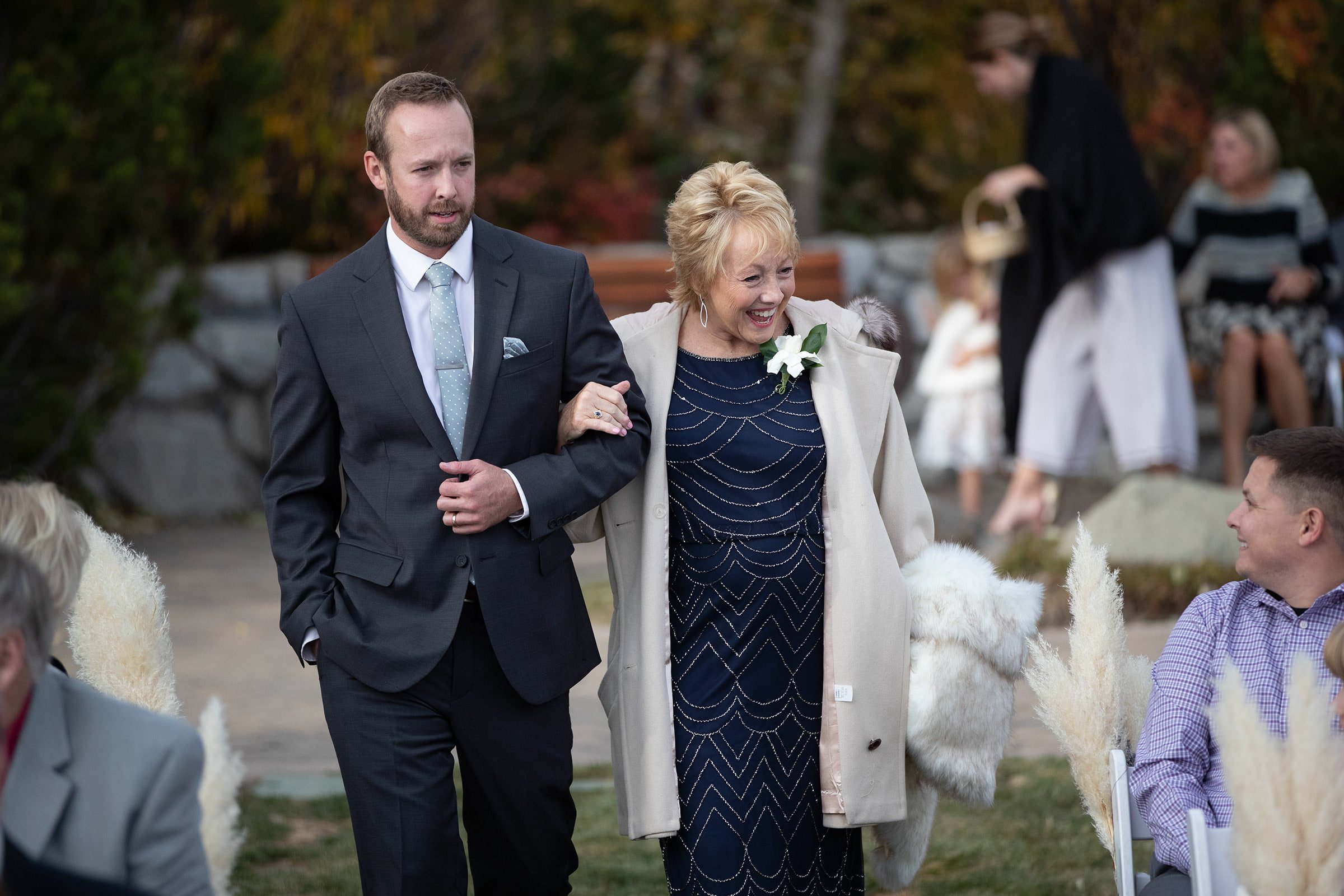 mother of the bride walking at ceremony.jpg