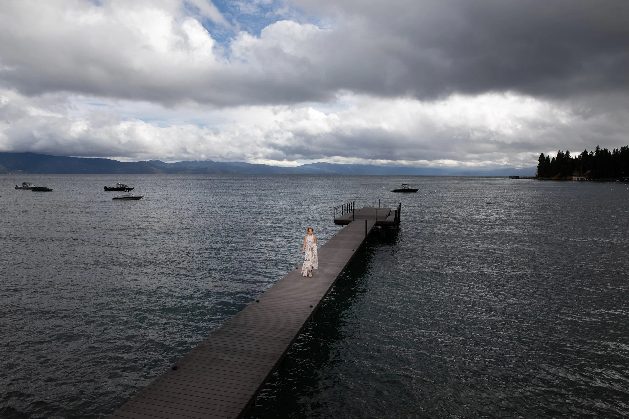 bride-walking-on-Tahoe-pier.jpg