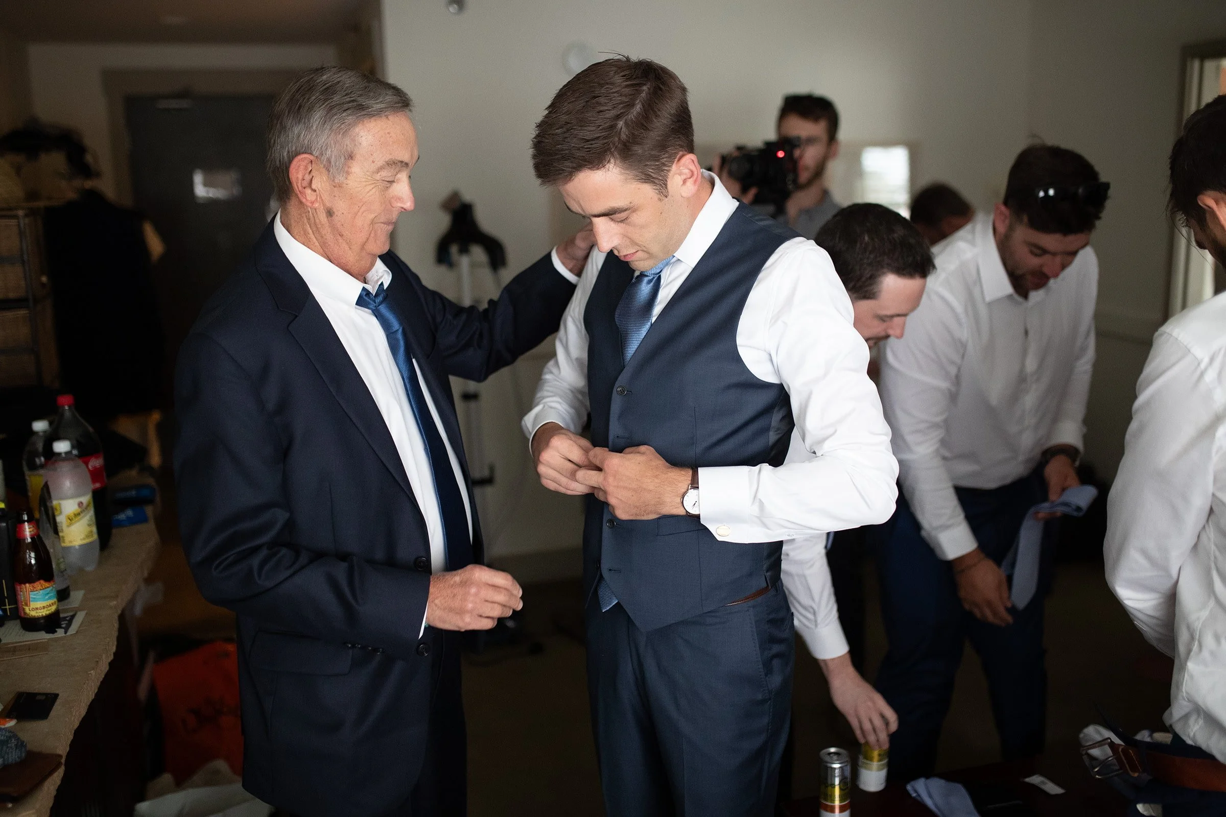 groom and father dressing plumpjack.jpg