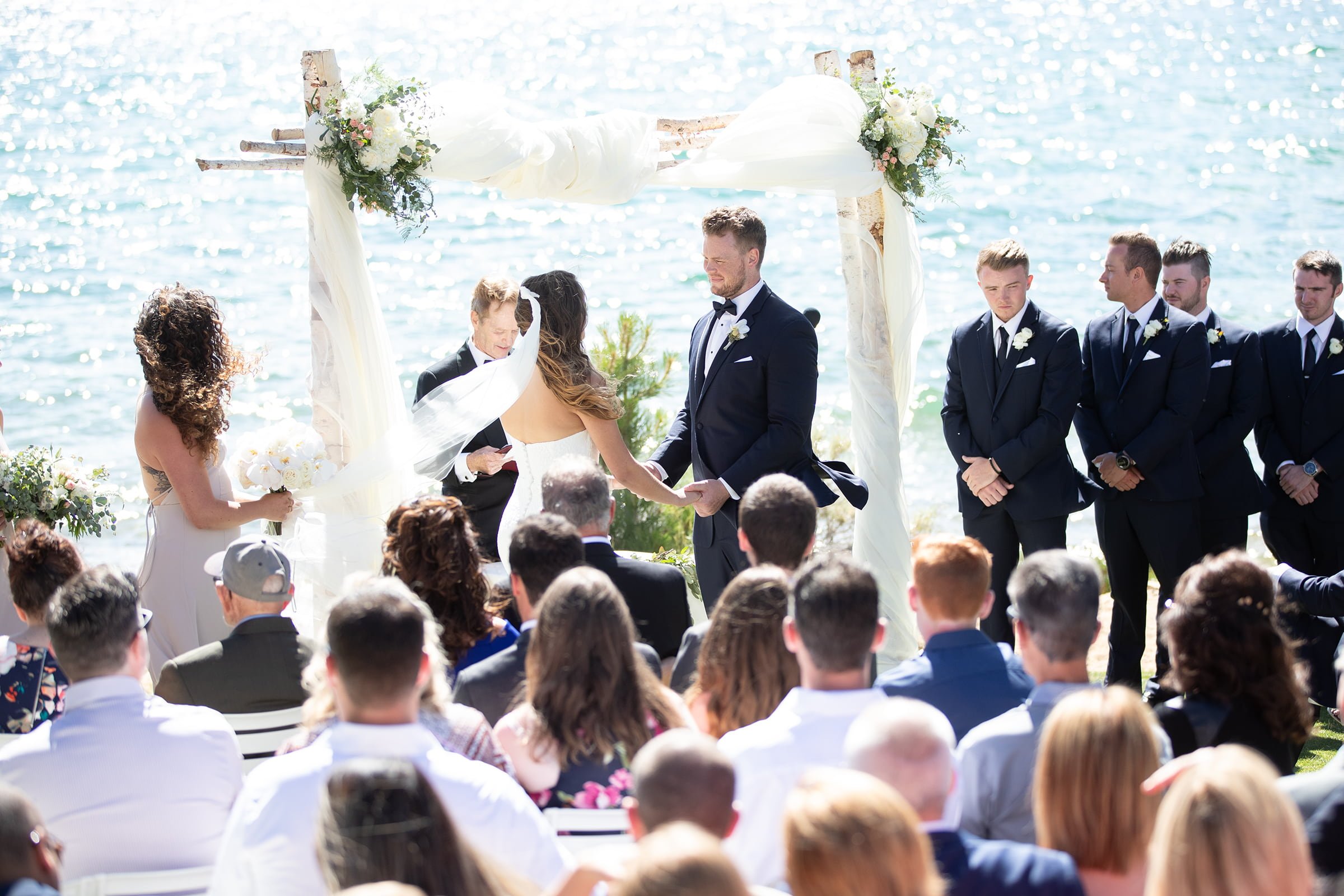 wedding ceremony by the blue water of tahoe