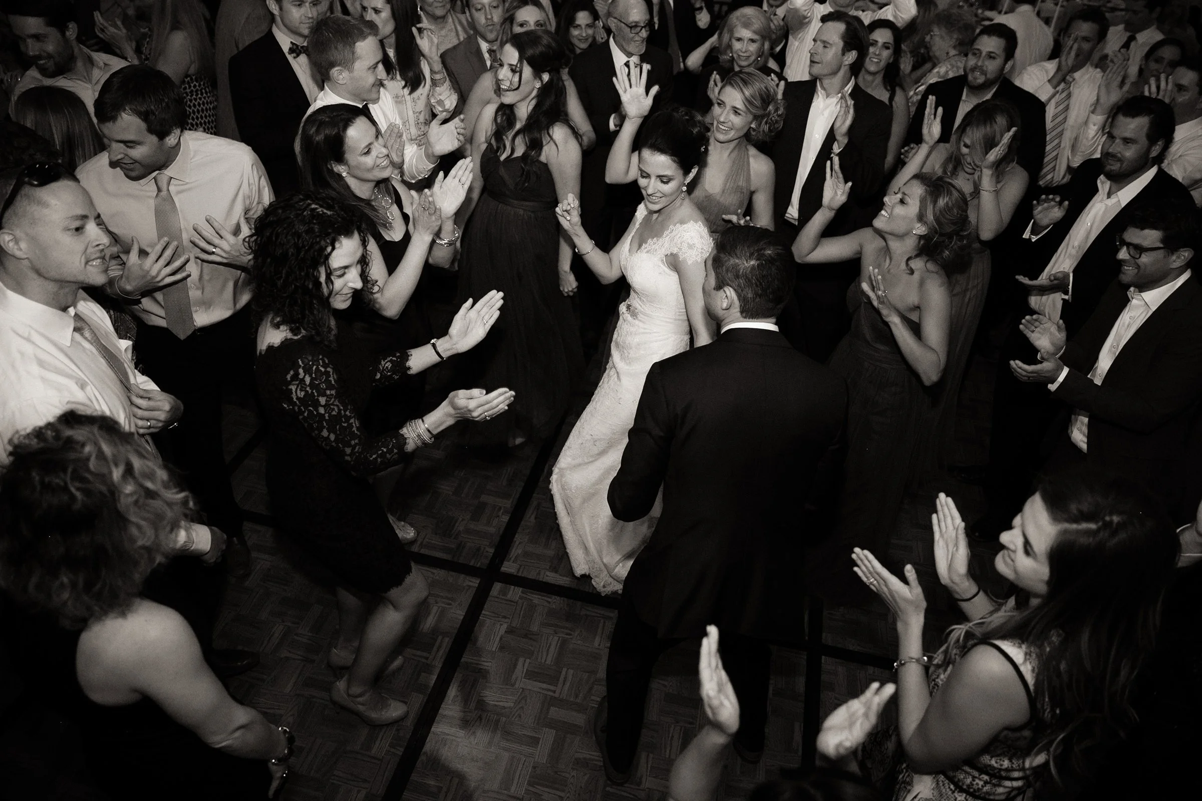 bride-and-groom-dancing-with-friends.jpg