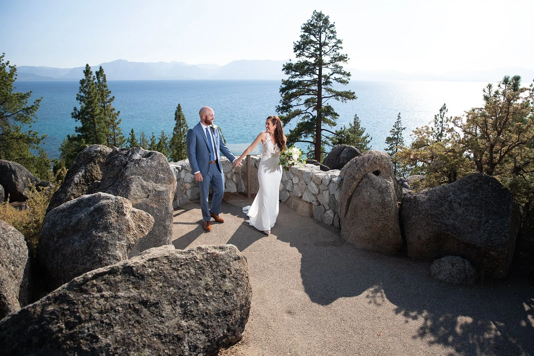 bride and groom with Tahoe as a backdrop