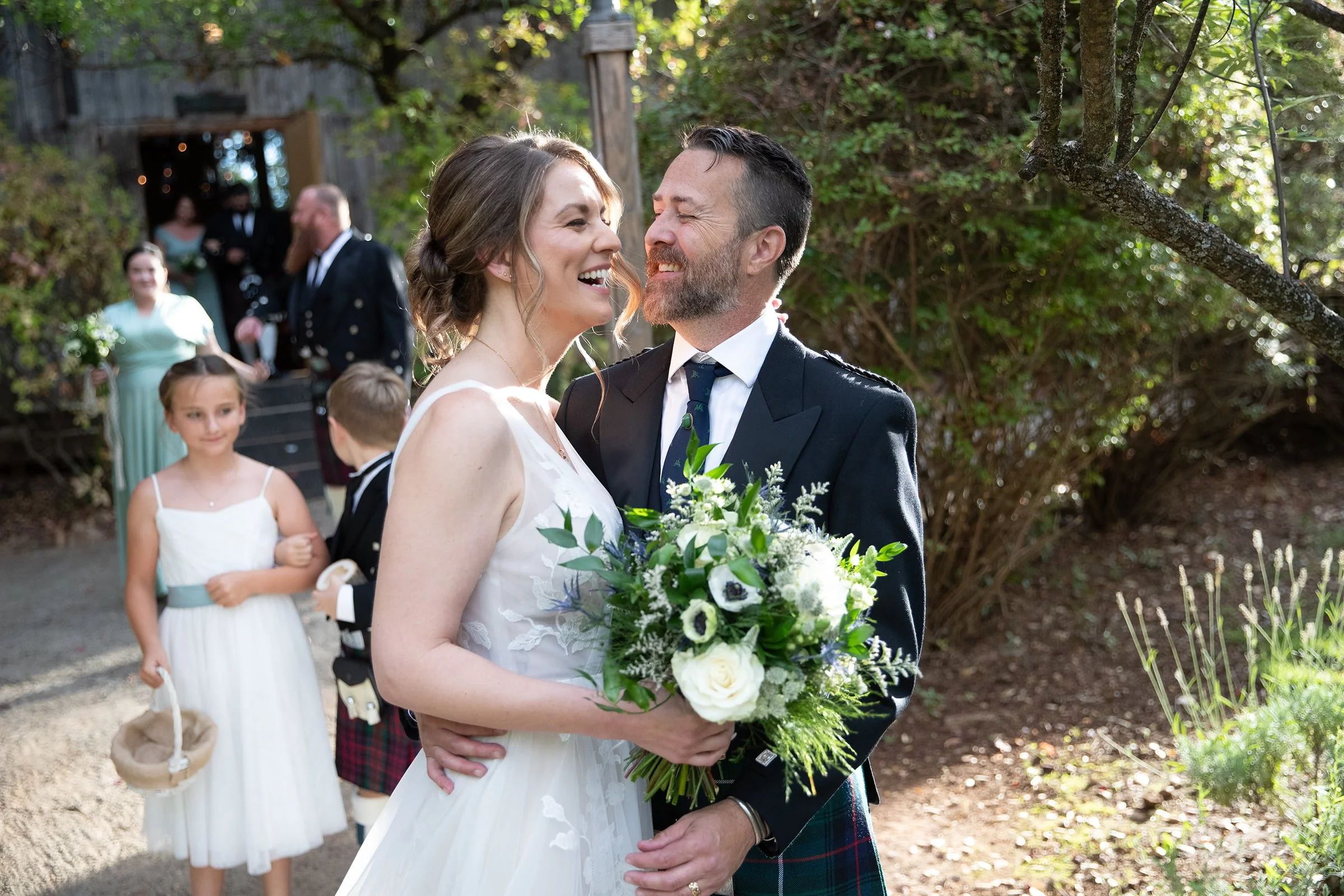 bride-and-groom-outside-the-chapel.jpg
