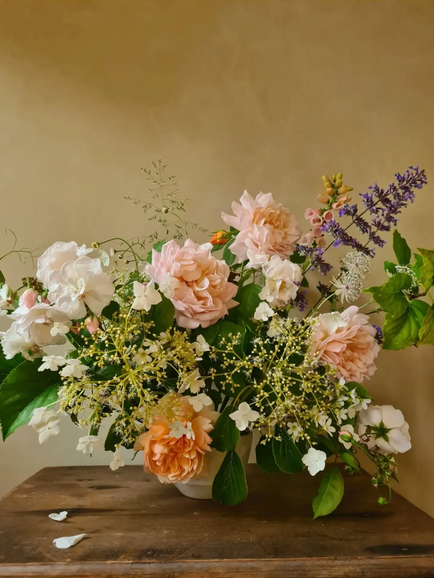 With the arrival of June, the garden is officially in full bloom, so it was time to grab the secateurs and bring the roses inside. 
I am a personal fan of peach and apricot tones, and these stunning David Austin roses look incredible, with the most a