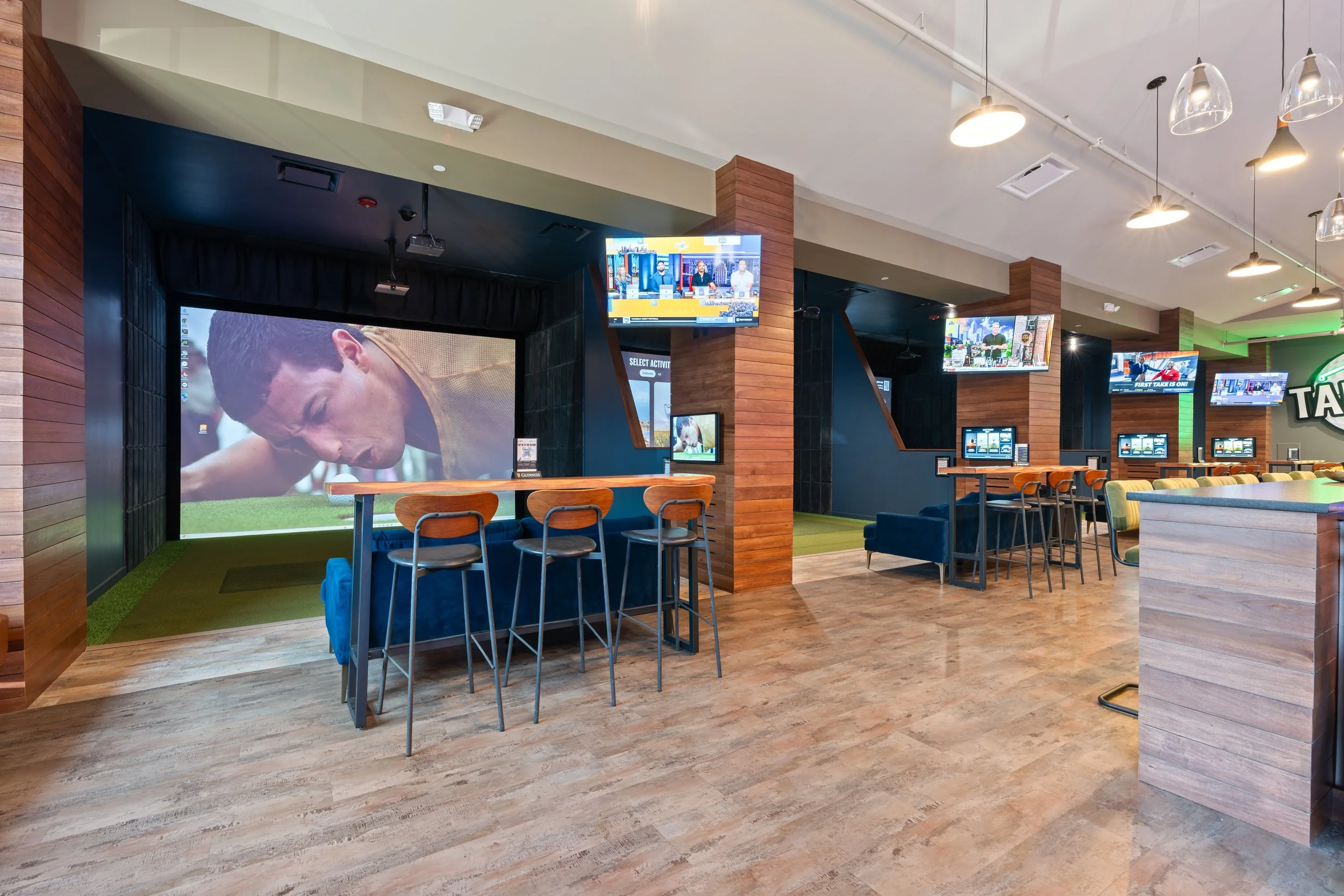 Interior Tap Ins Tap Ins sports bars in Hoover, AL. A go-to spot for golf simulators and games . project by B Group Architecture, Inc.