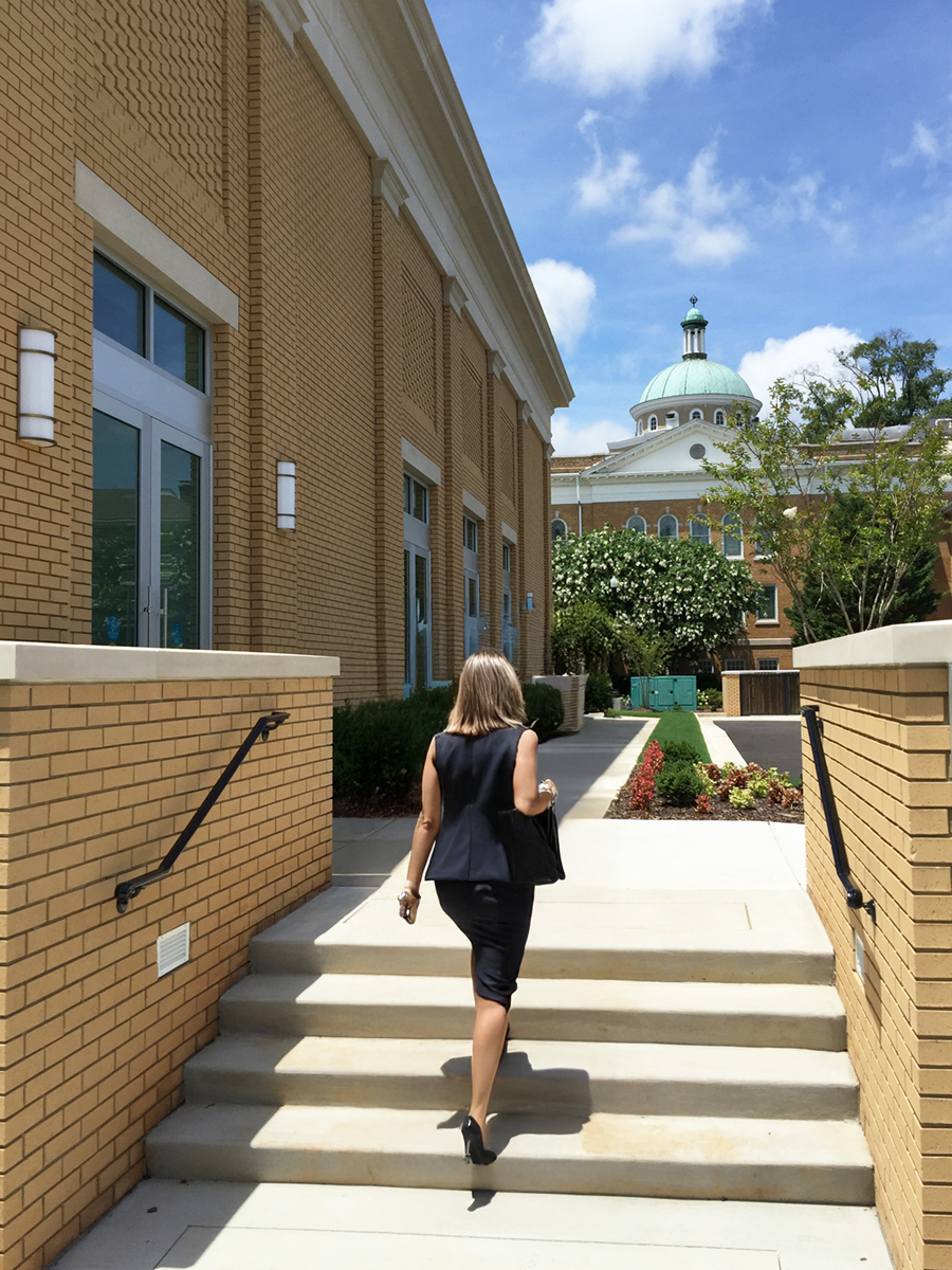 A side facade of Athens City Hall showing brick and granite stone. - project by B Group Architecture, Inc.