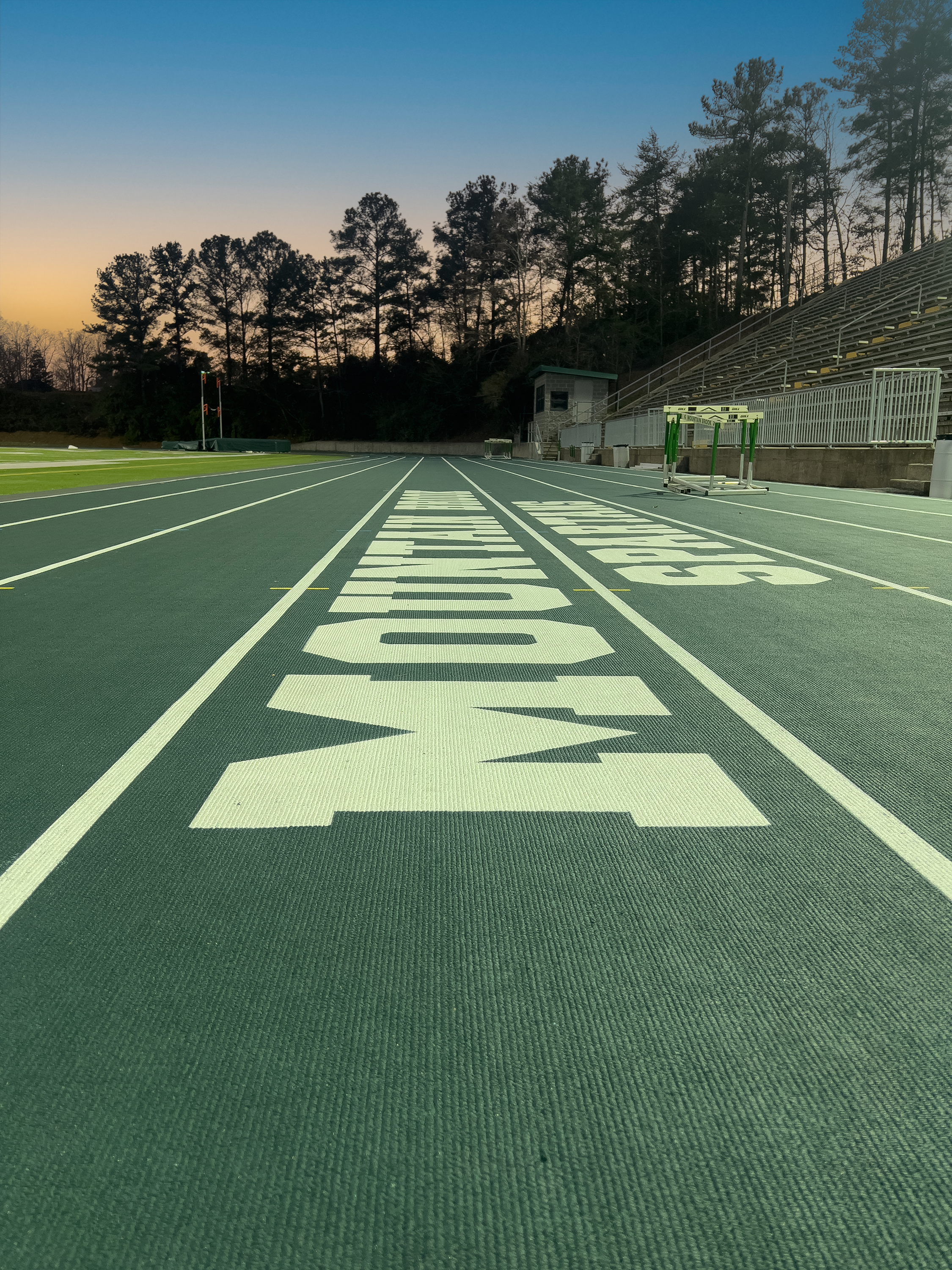 View of Mountain Brook Spartans running track. project by B Group Architecture, Inc.